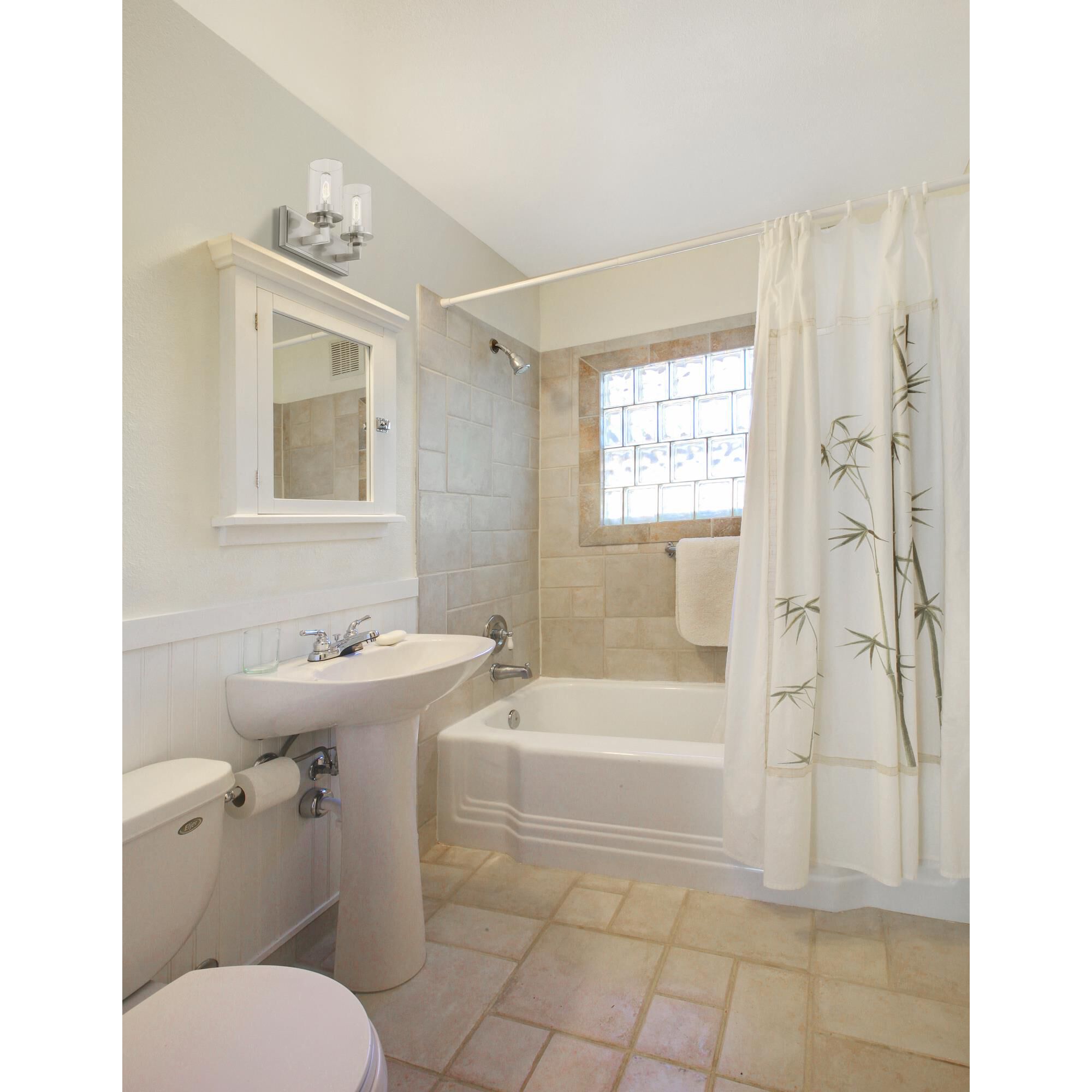 Shown in Brushed Nickel finish and Glass shade