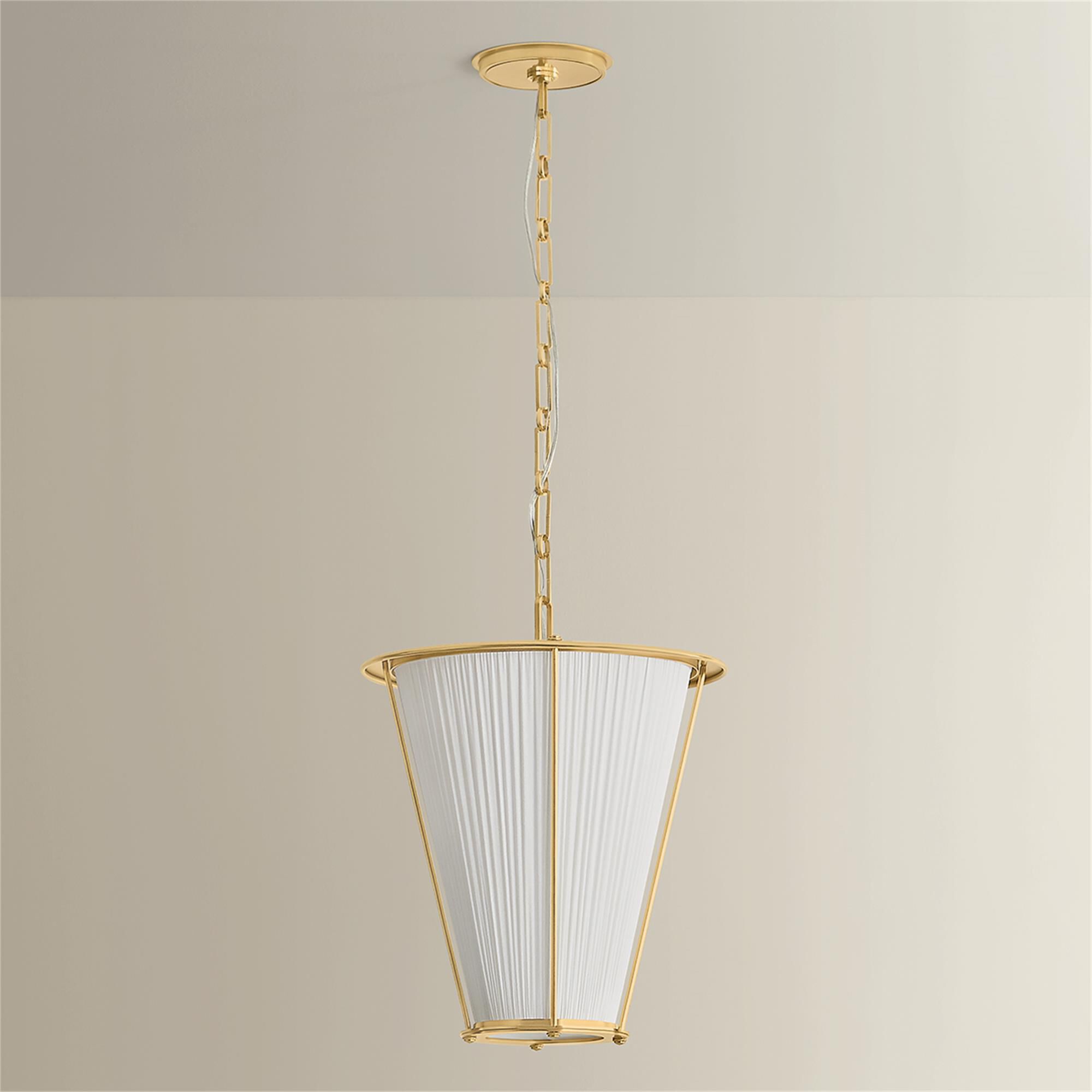Shown in Aged Brass finish and Ivory Silk shade