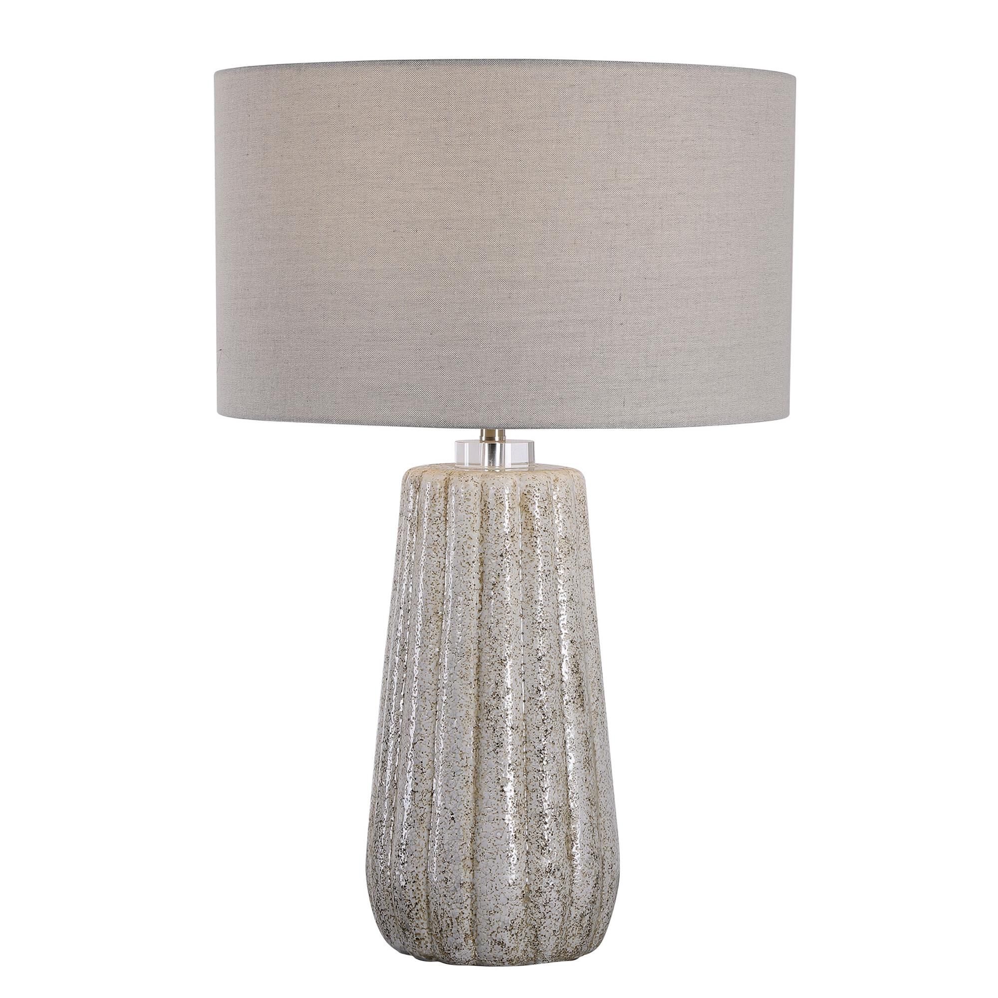Shown in This Ceramic Table Lamp Features A Fluted Design With A Porous Texture Finished In A Stone-Ivory And finish and Round Drum Hardback shade