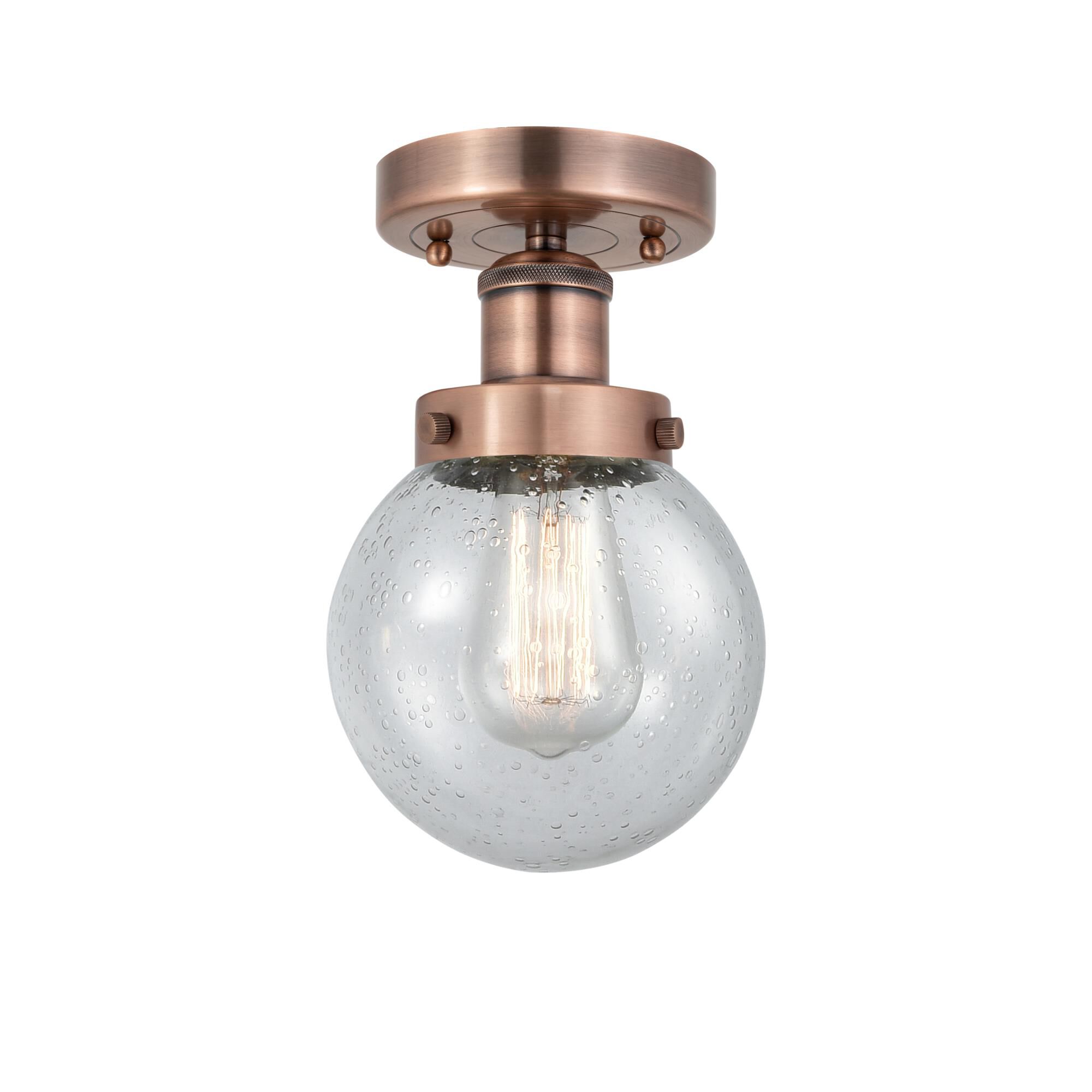 Shown in Antique Copper finish and Seedy glass