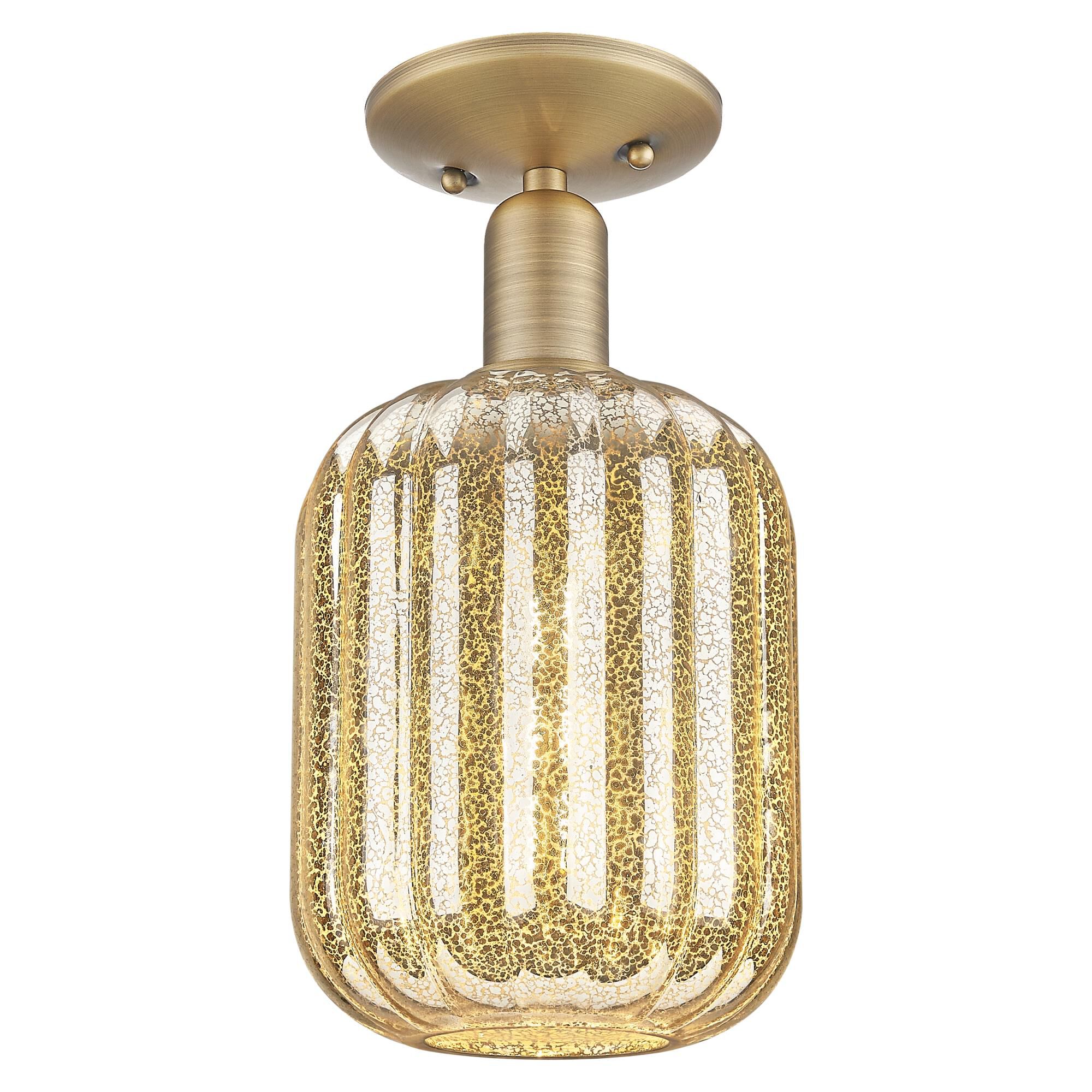 Shown in Brushed Brass finish and Mercury glass