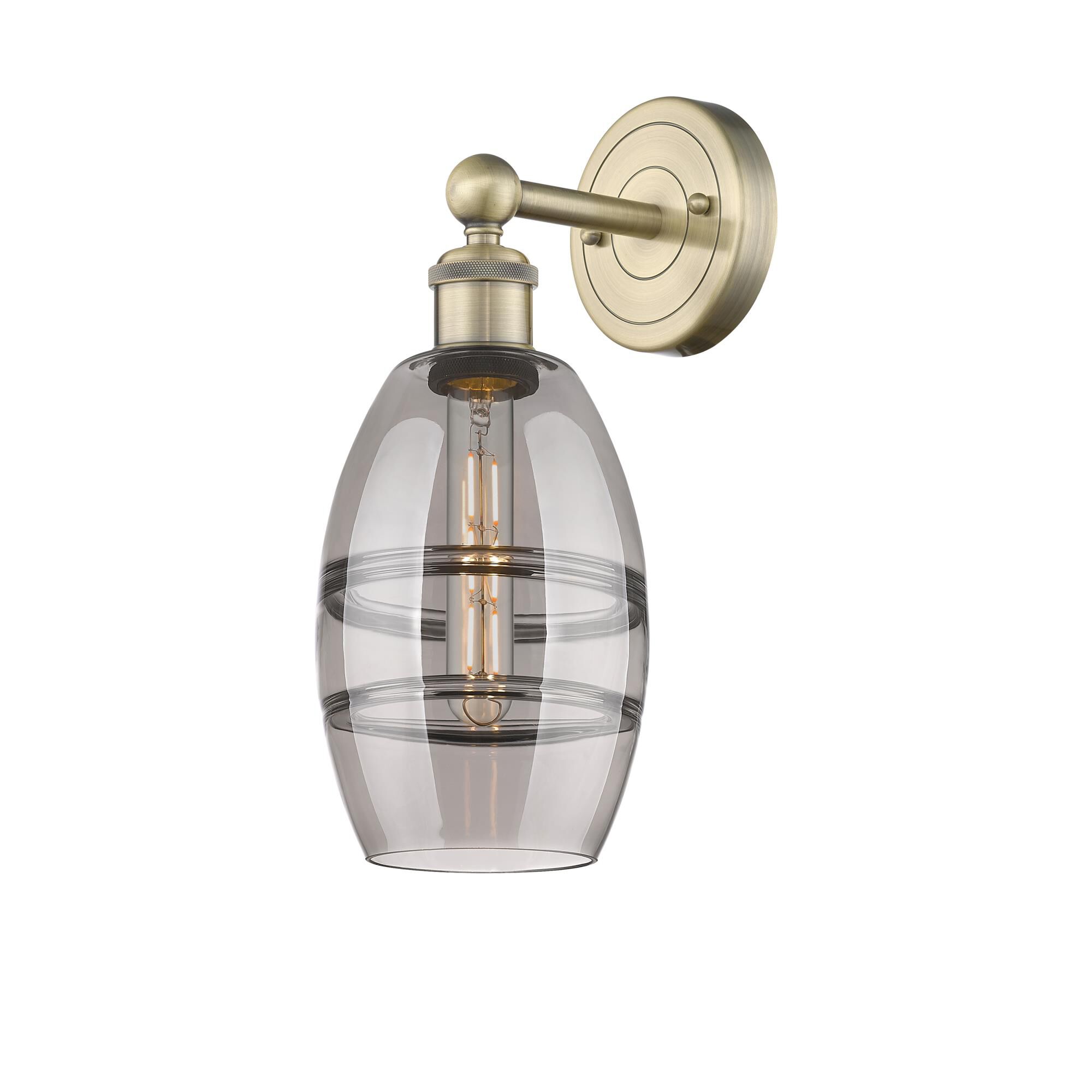 Shown in Antique Brass finish and Light Smoke glass