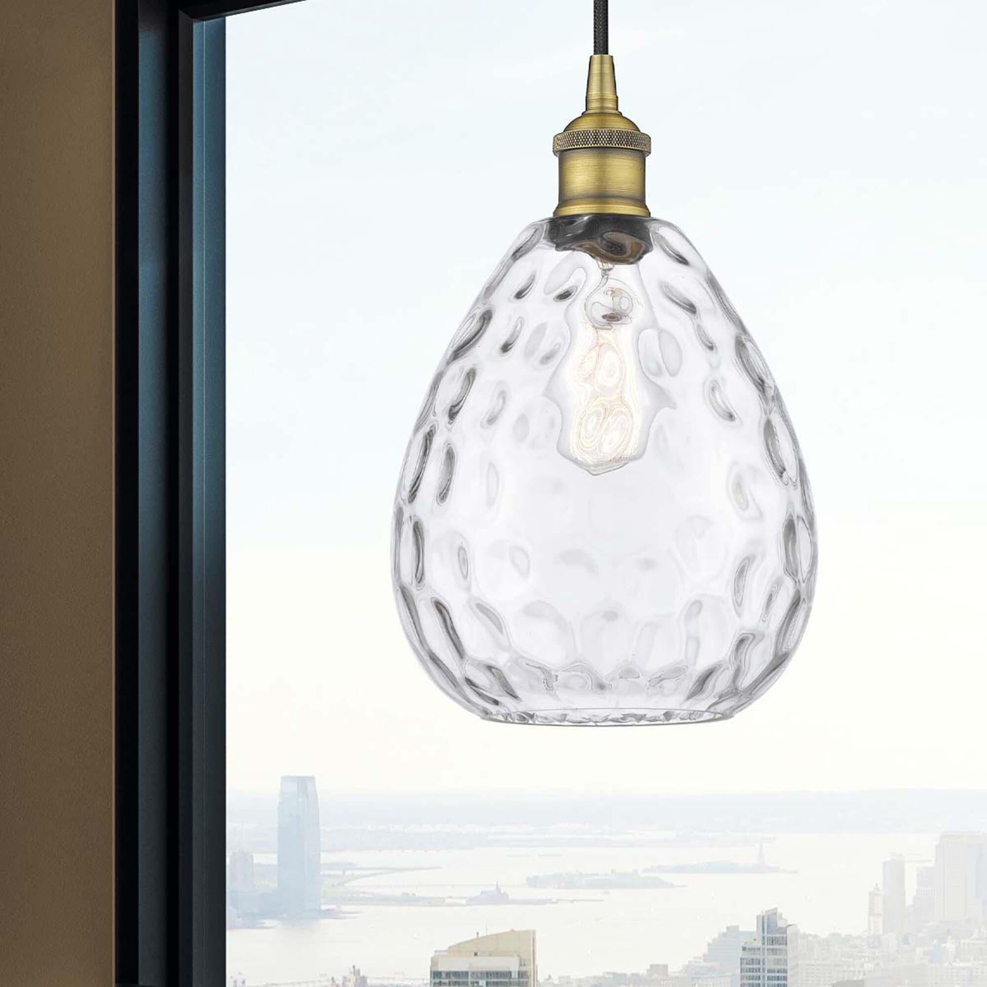 Shown in Brushed Brass finish and Clear Large Waverly glass