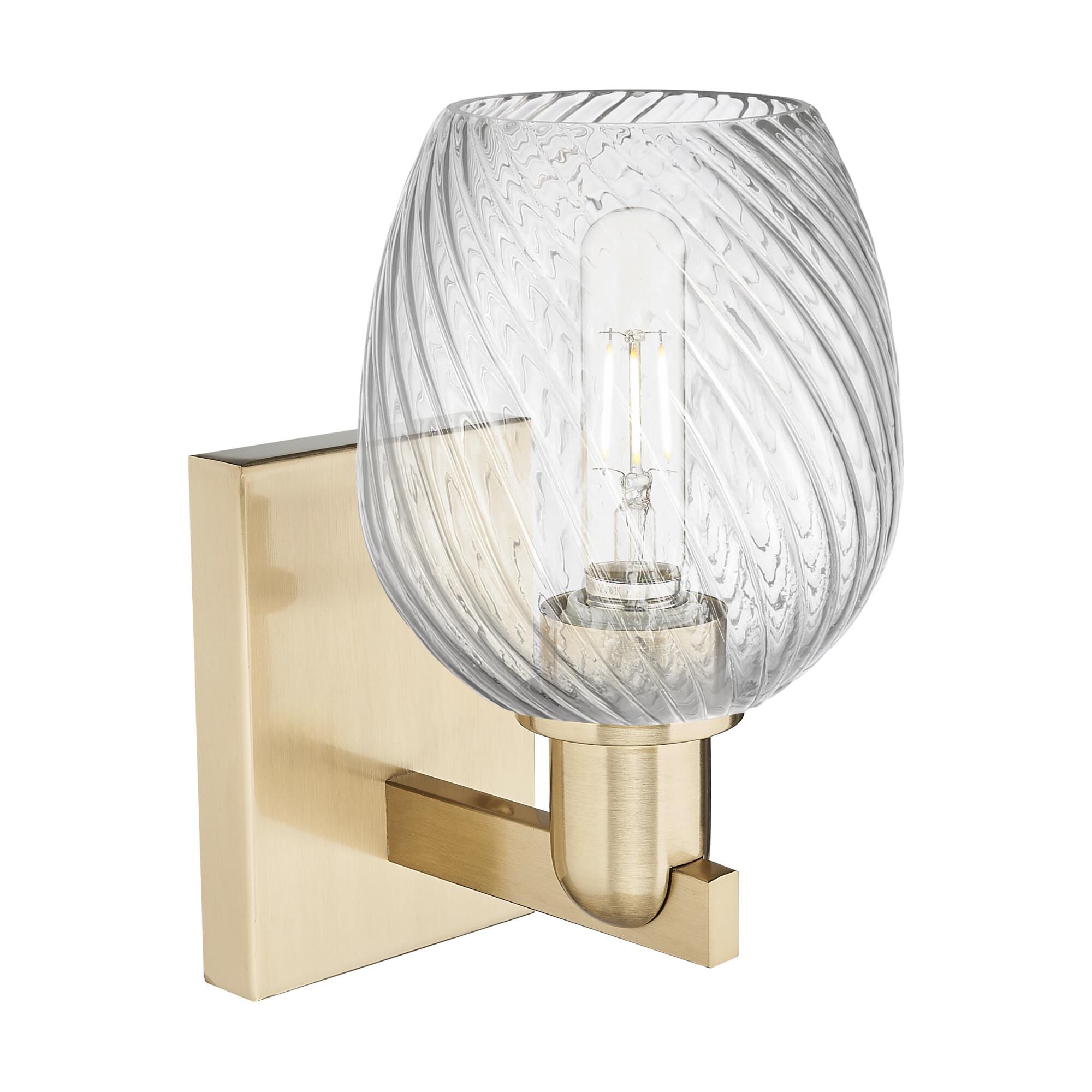 Shown in Champagne Bronze finish and Clear Spiral Fluted glass