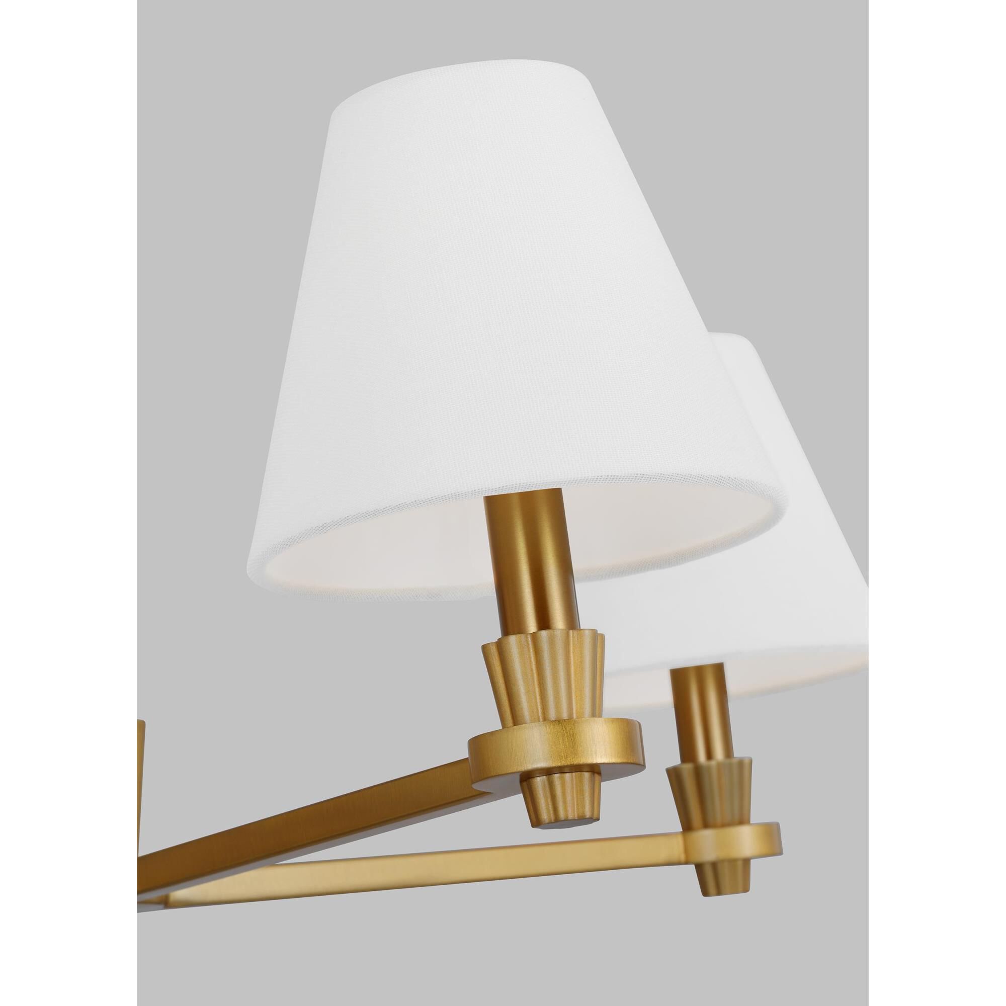 Shown in Burnished Brass finish and White Linen Fabric s shade