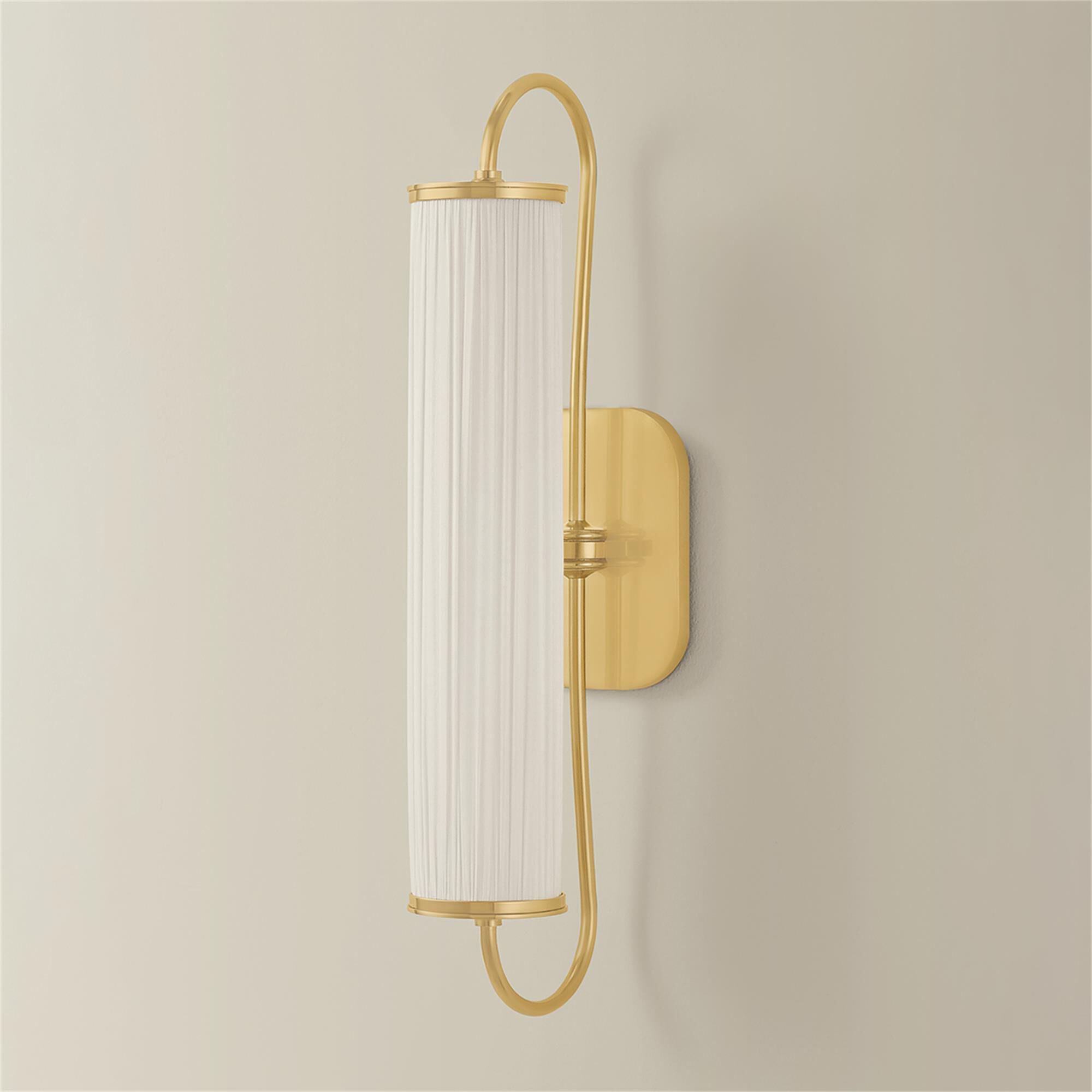 Shown in Aged Brass finish and Ivory Silk shade