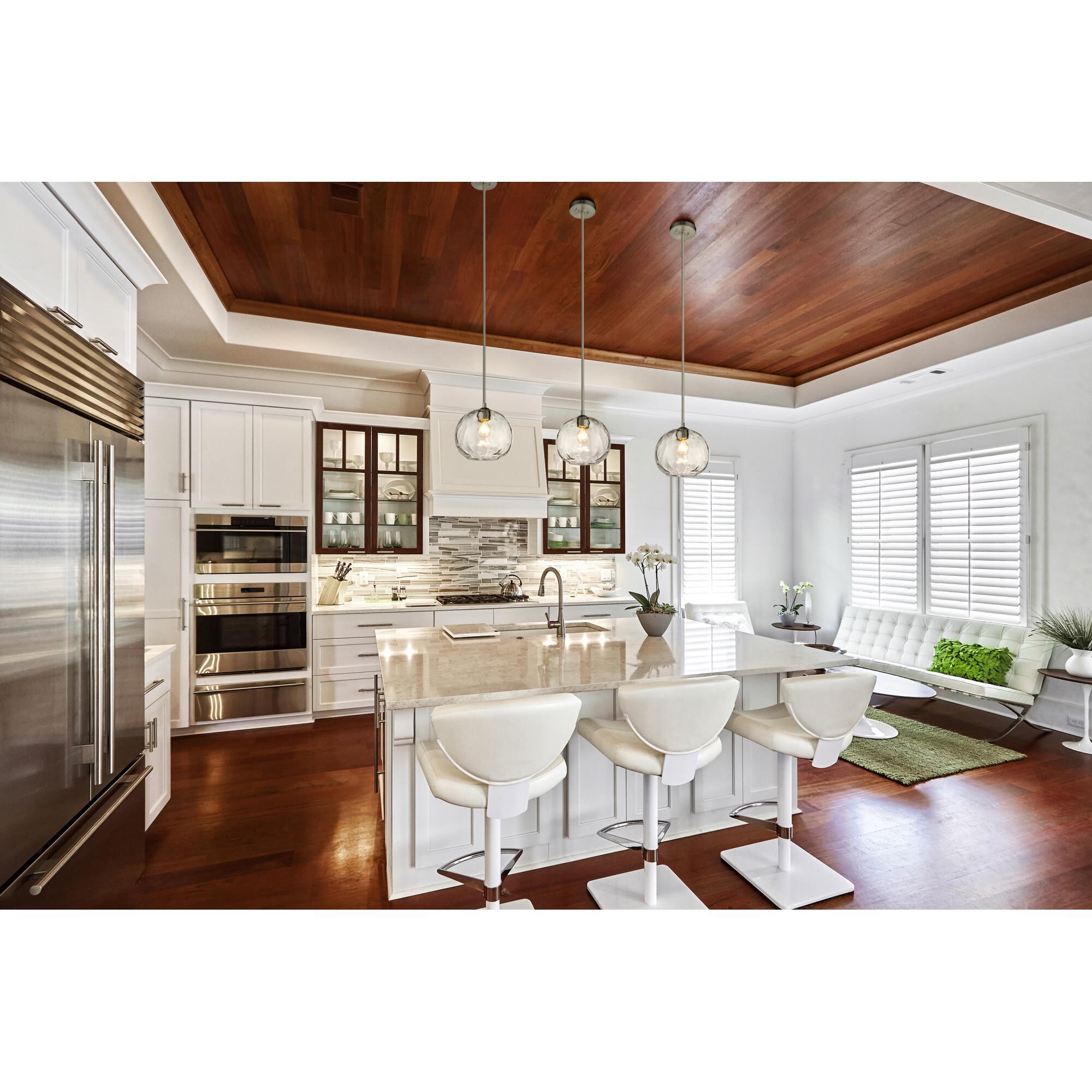 Shown in Brushed Nickel finish and Glass shade