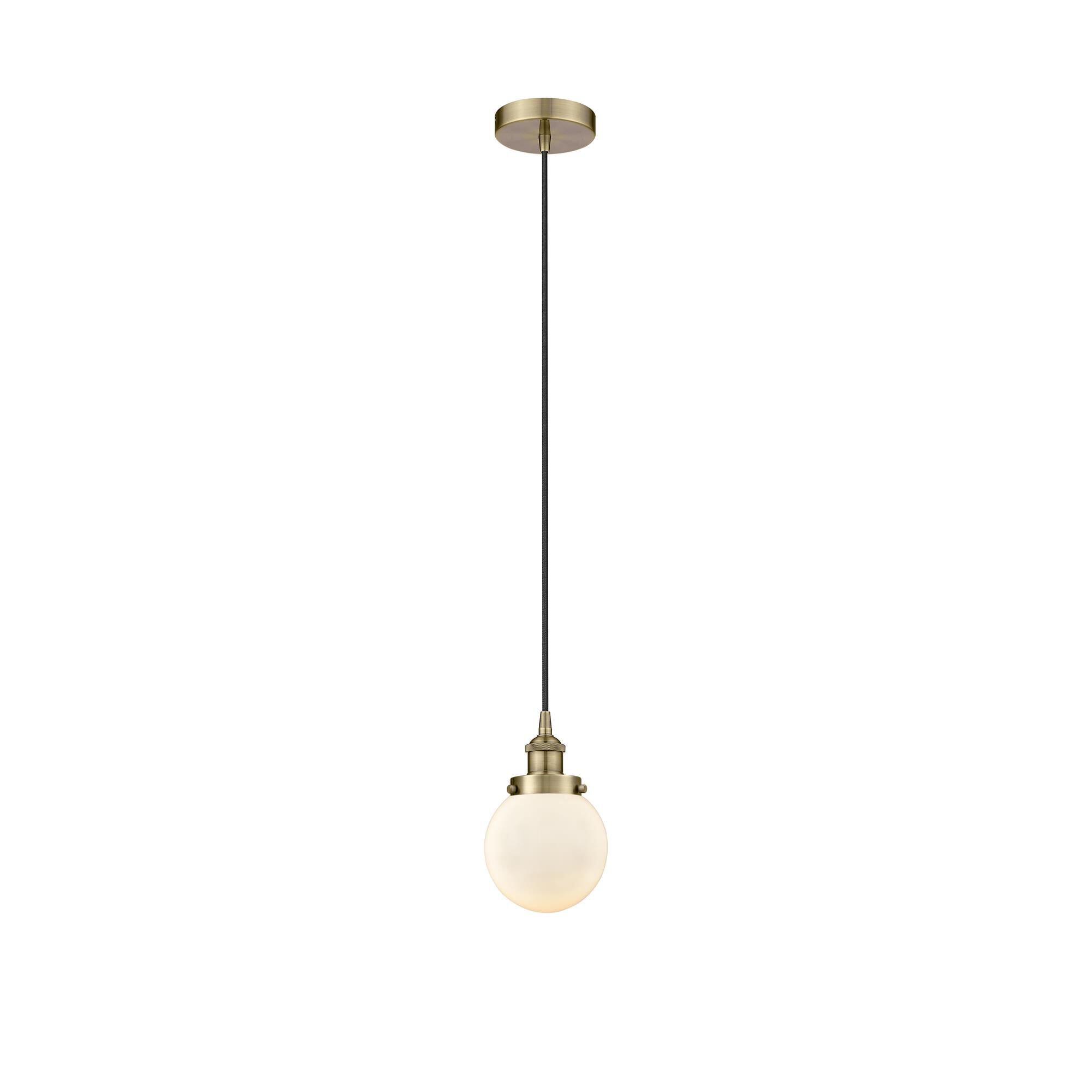 Shown in Antique Brass finish and Matte White glass