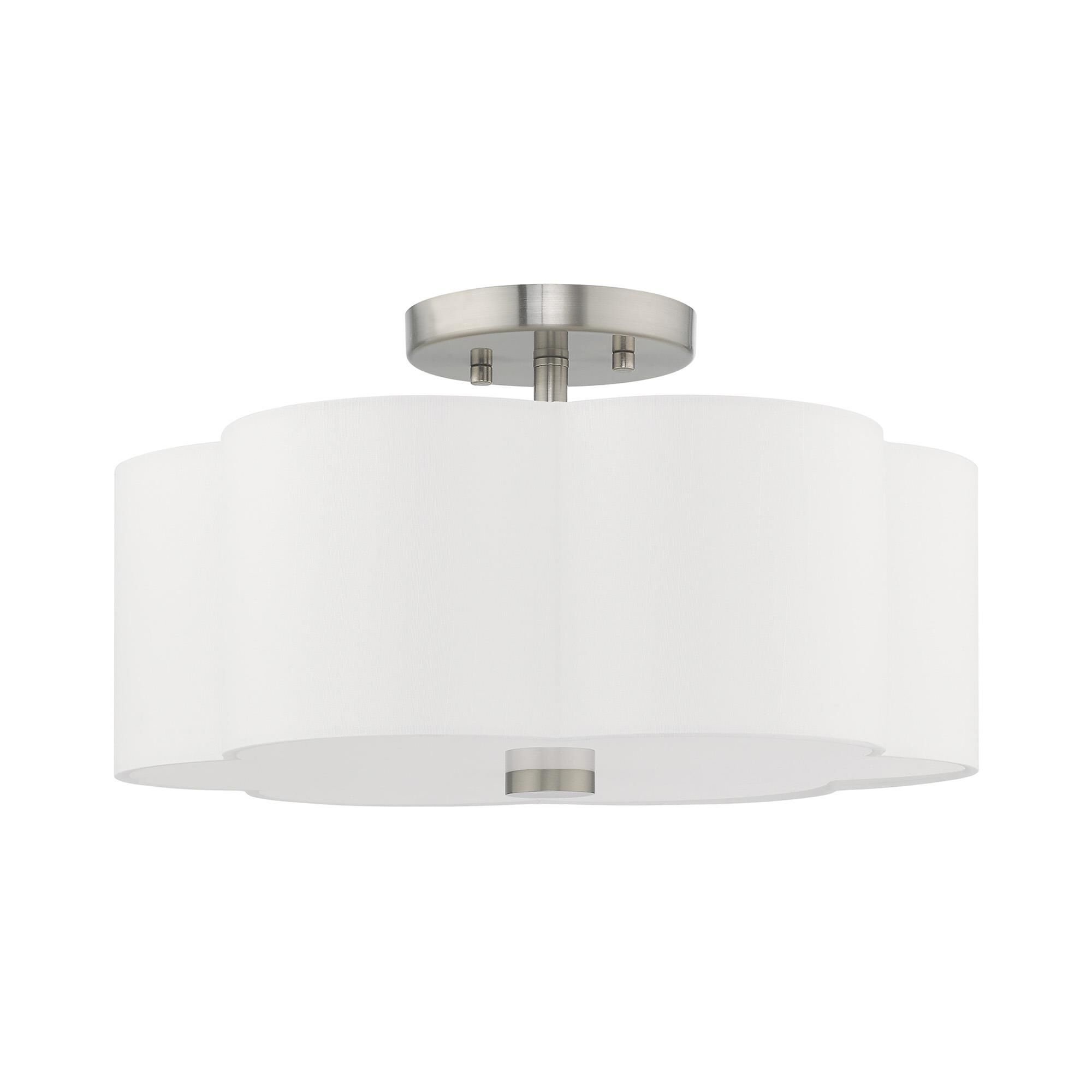 Shown in Brushed Nickel finish and Hand Crafted Off-White Fabric Hardback shade