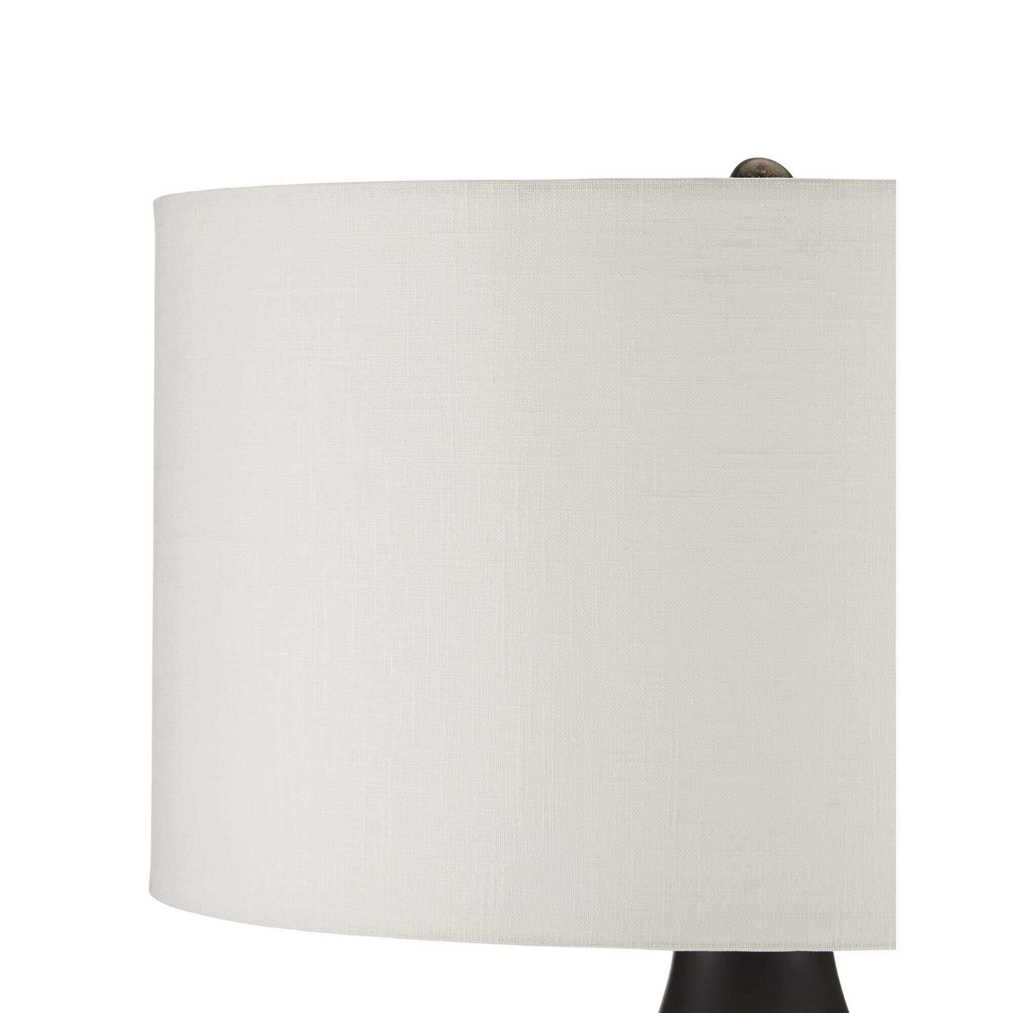 Shown in Antique Brass/Black/Whitewash finish and Off-White Linen shade