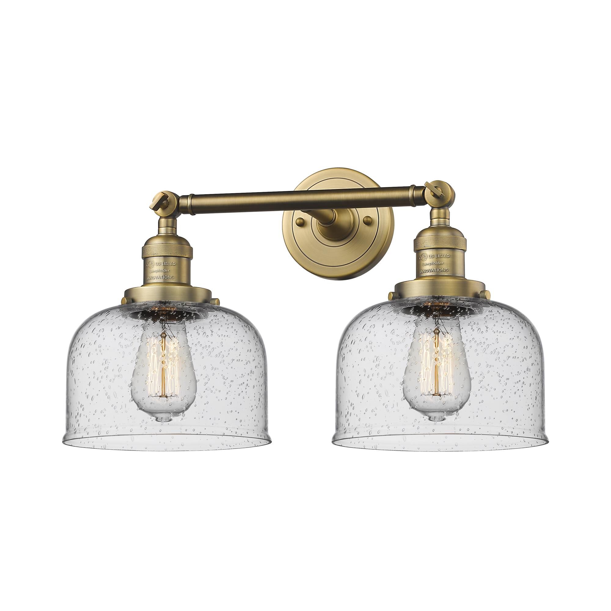 Shown in Brushed Brass finish and Seedy glass