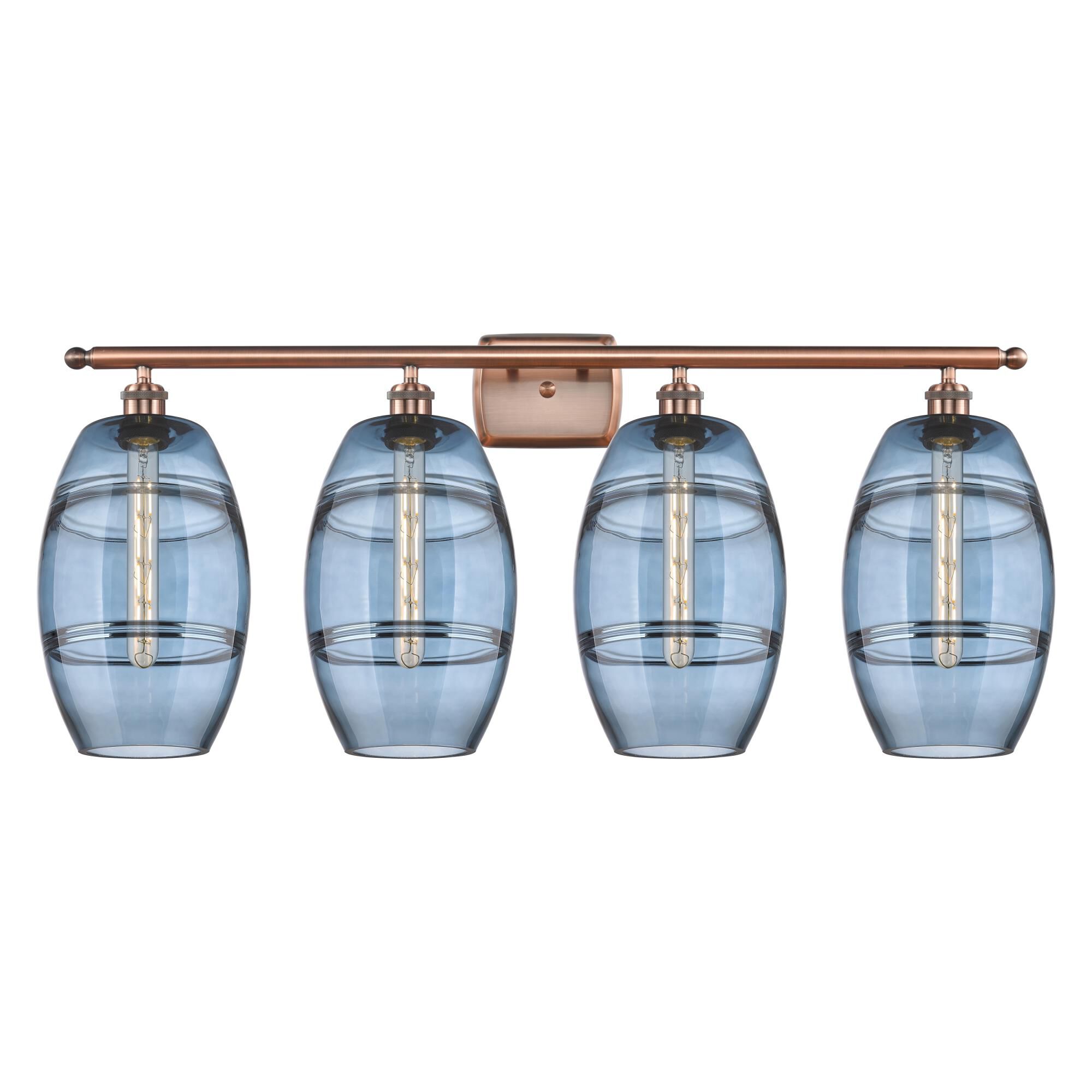 Shown in Antique Copper finish and Princess Blue glass