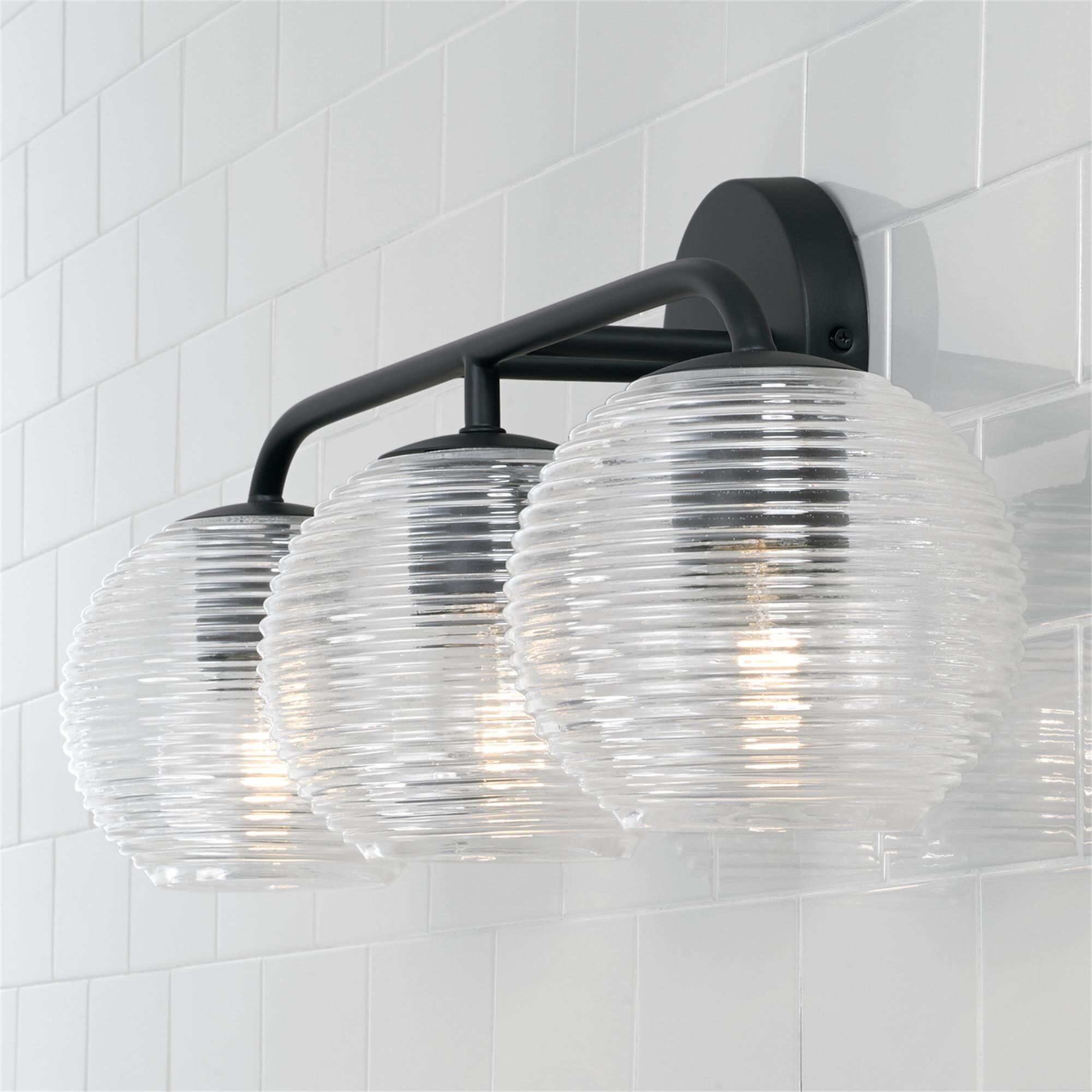 Shown in Matte Black finish and Clear Ribbed glass