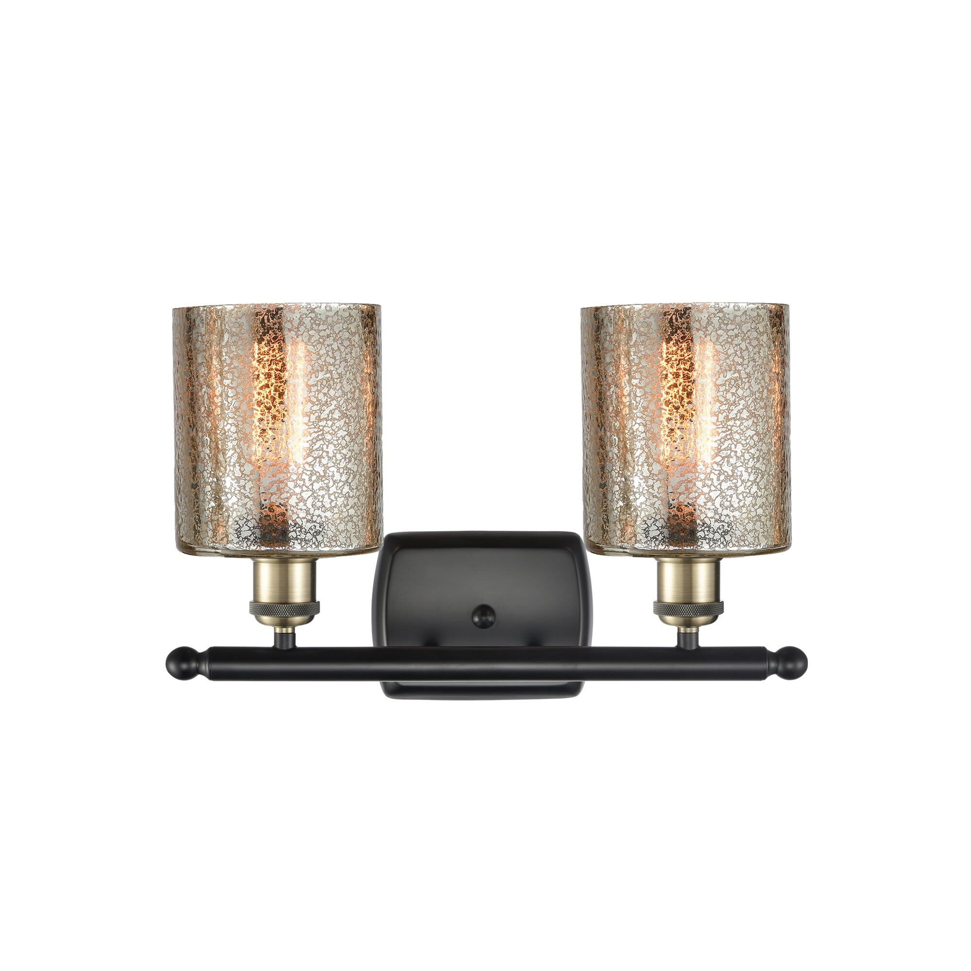 Shown in Black Antique Brass finish and Drum glass and Glass shade and Polished Chrome accent