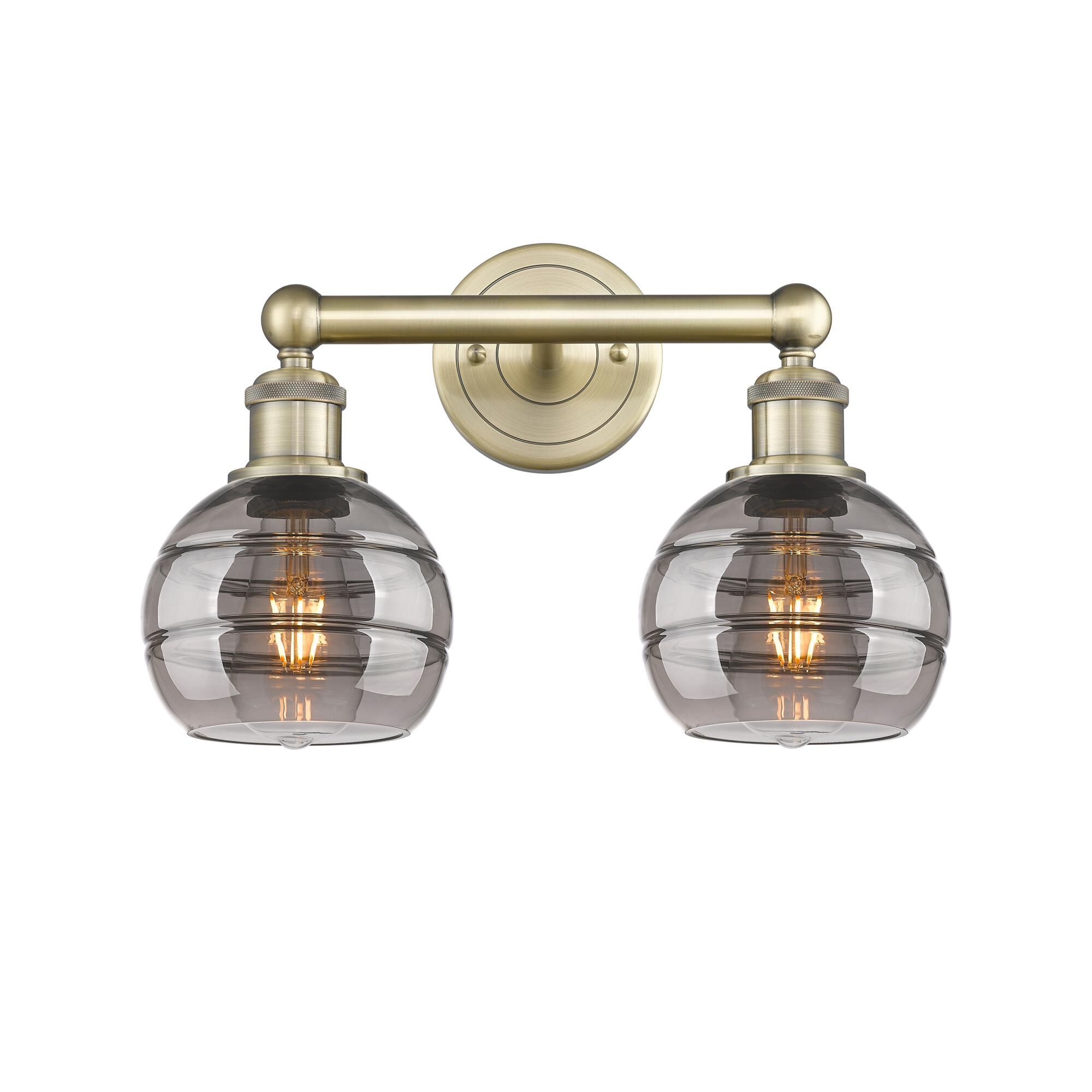 Shown in Antique Brass finish and Light Smoke glass