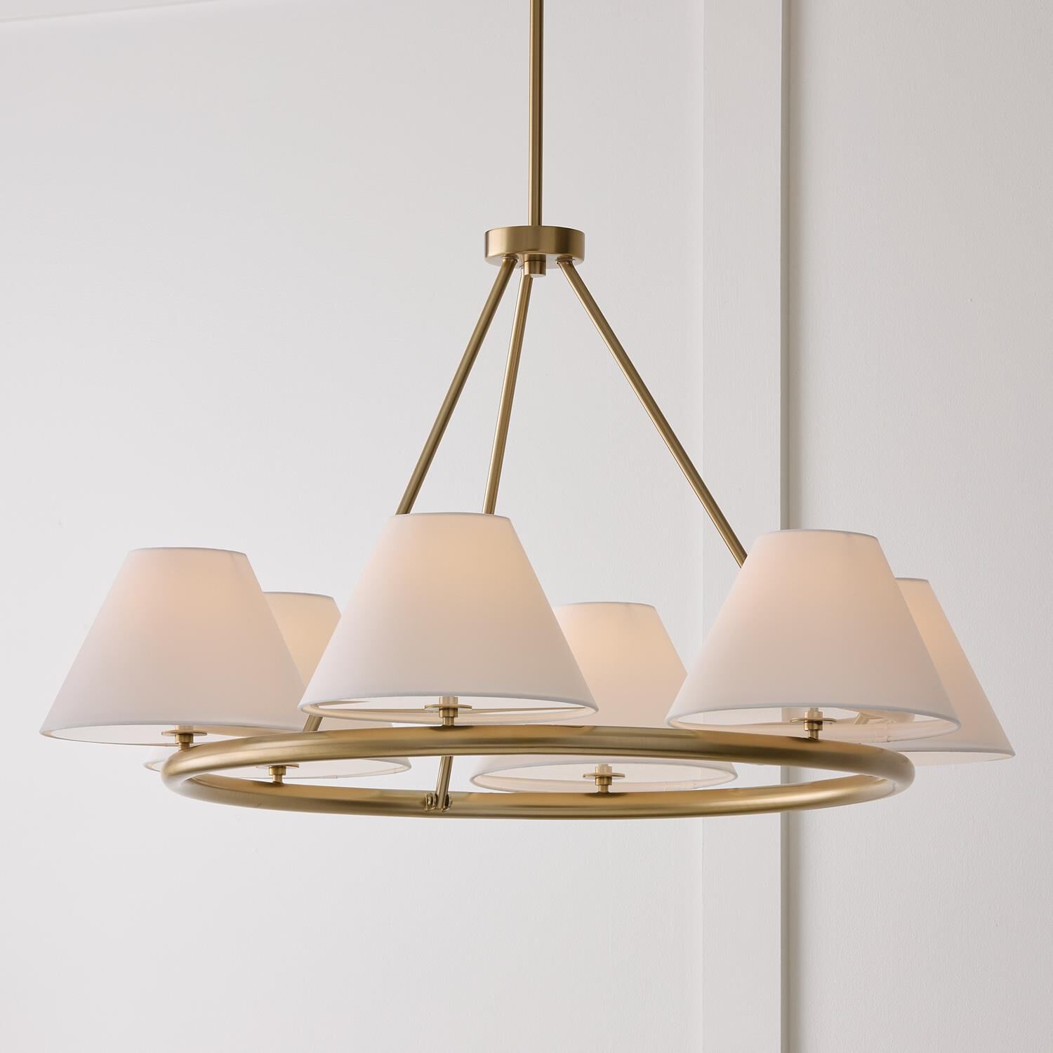 Shown in Matte Brass finish and Soft White Fabric Stay-Straight shade