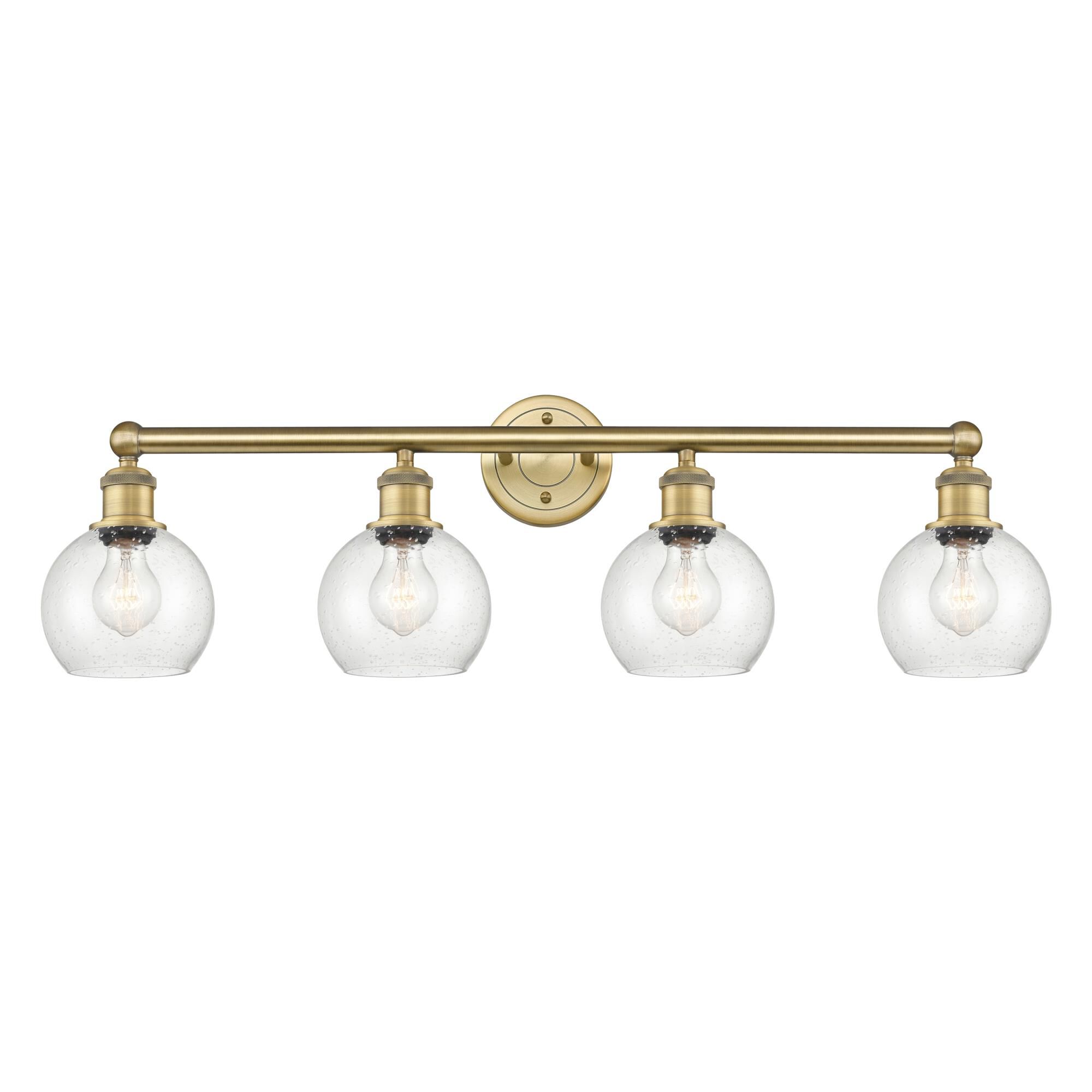 Shown in Brushed Brass finish and Seedy glass