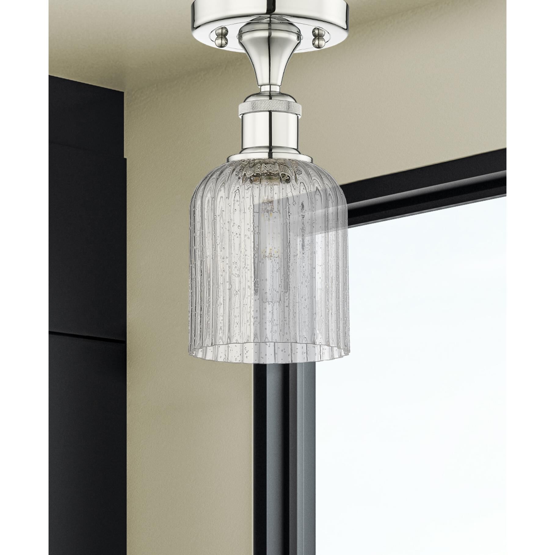 Shown in Polished Nickel finish and Seedy glass
