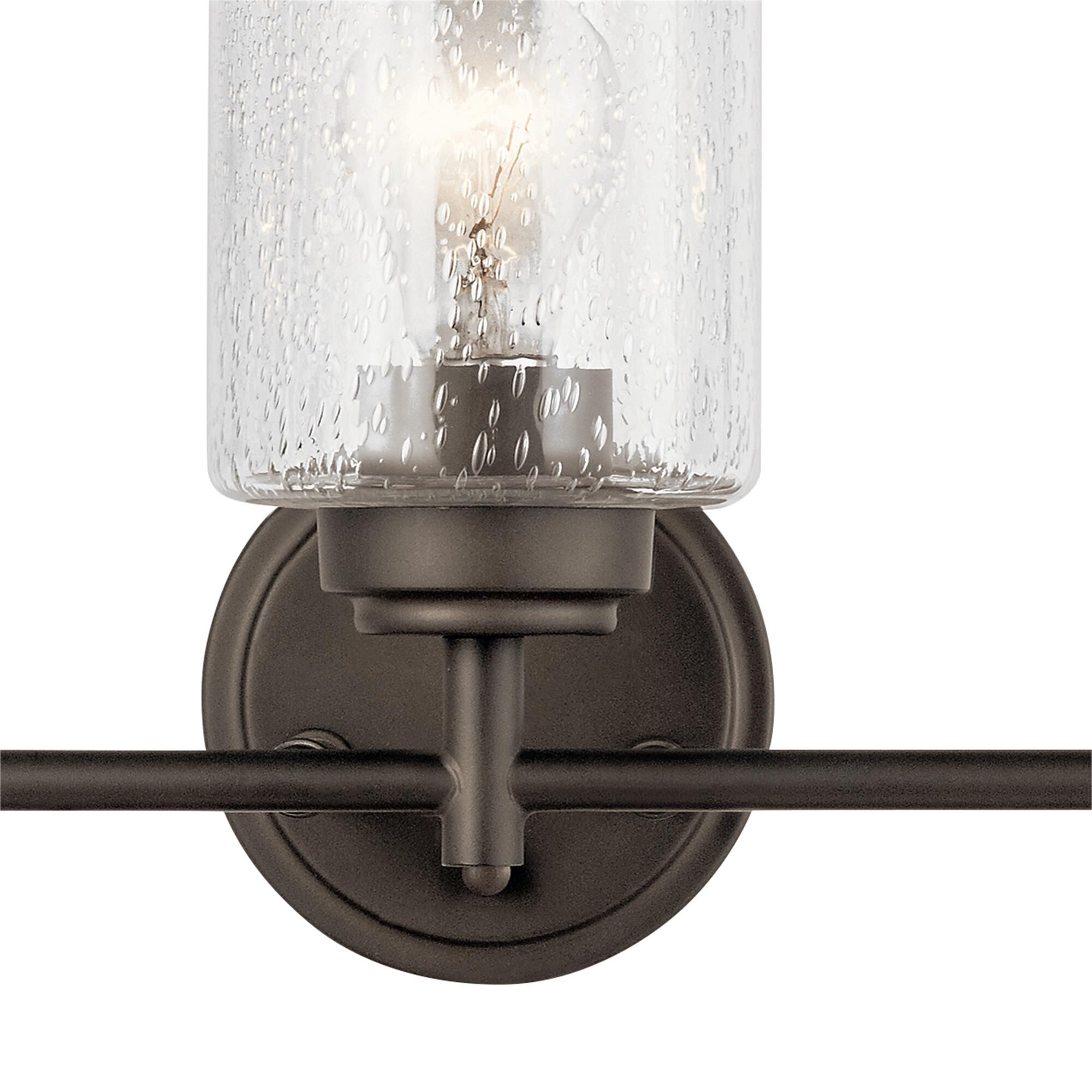 Shown in Olde Bronze finish and Clear Seeded glass
