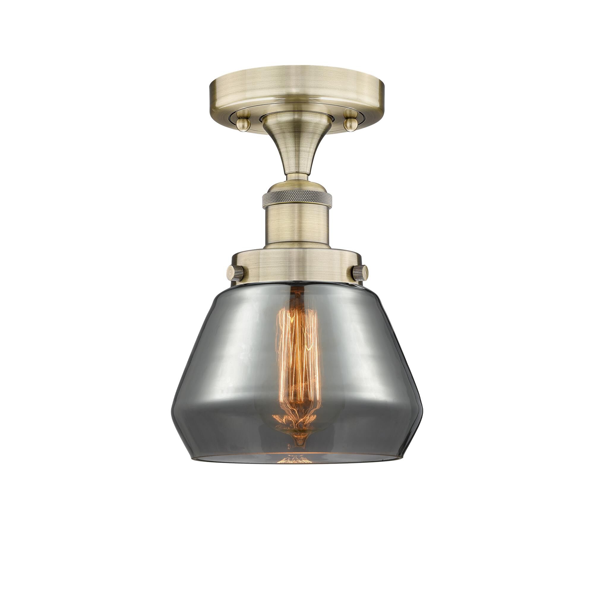Shown in Antique Brass finish and Plated Smoke glass