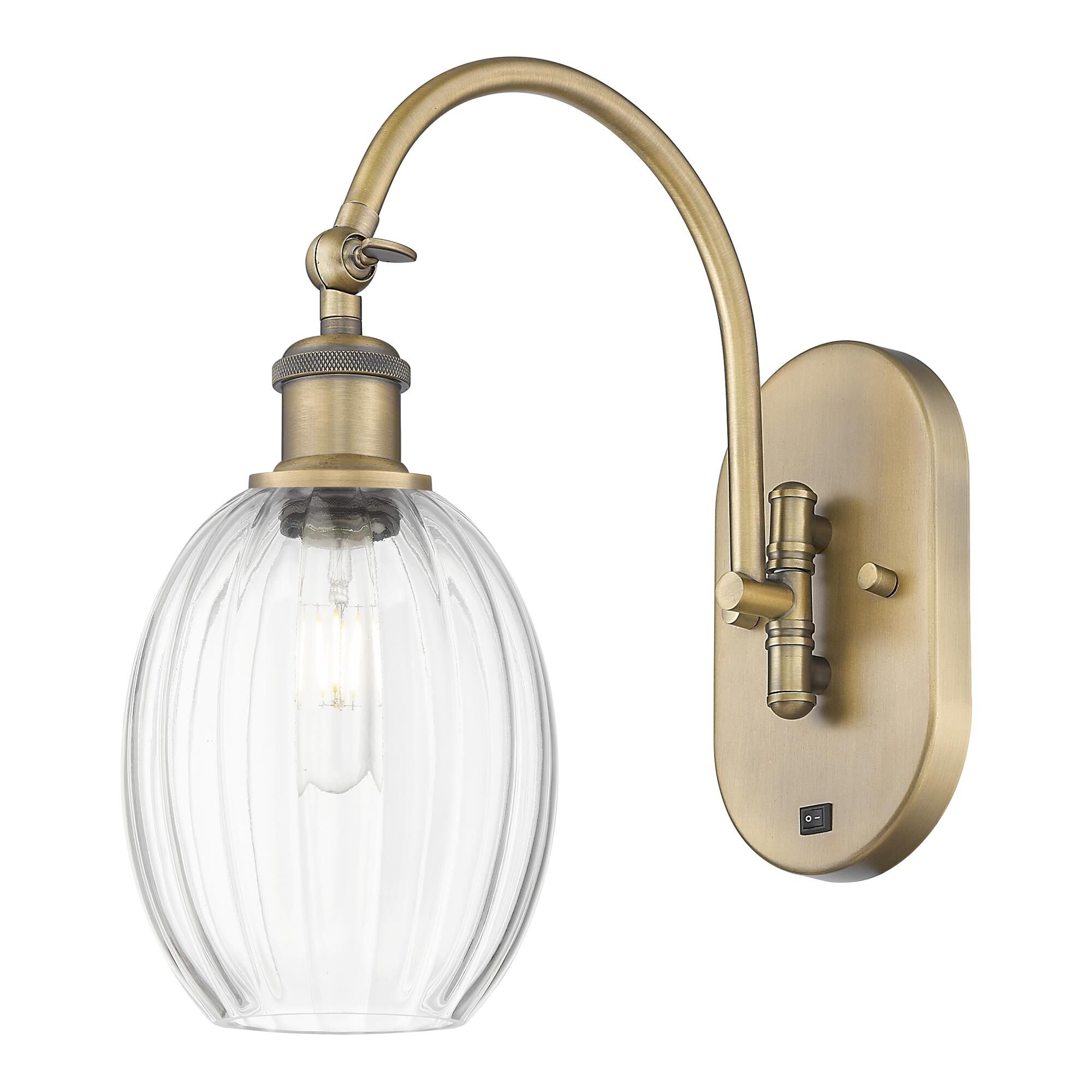 Shown in Brushed Brass finish and Clear glass