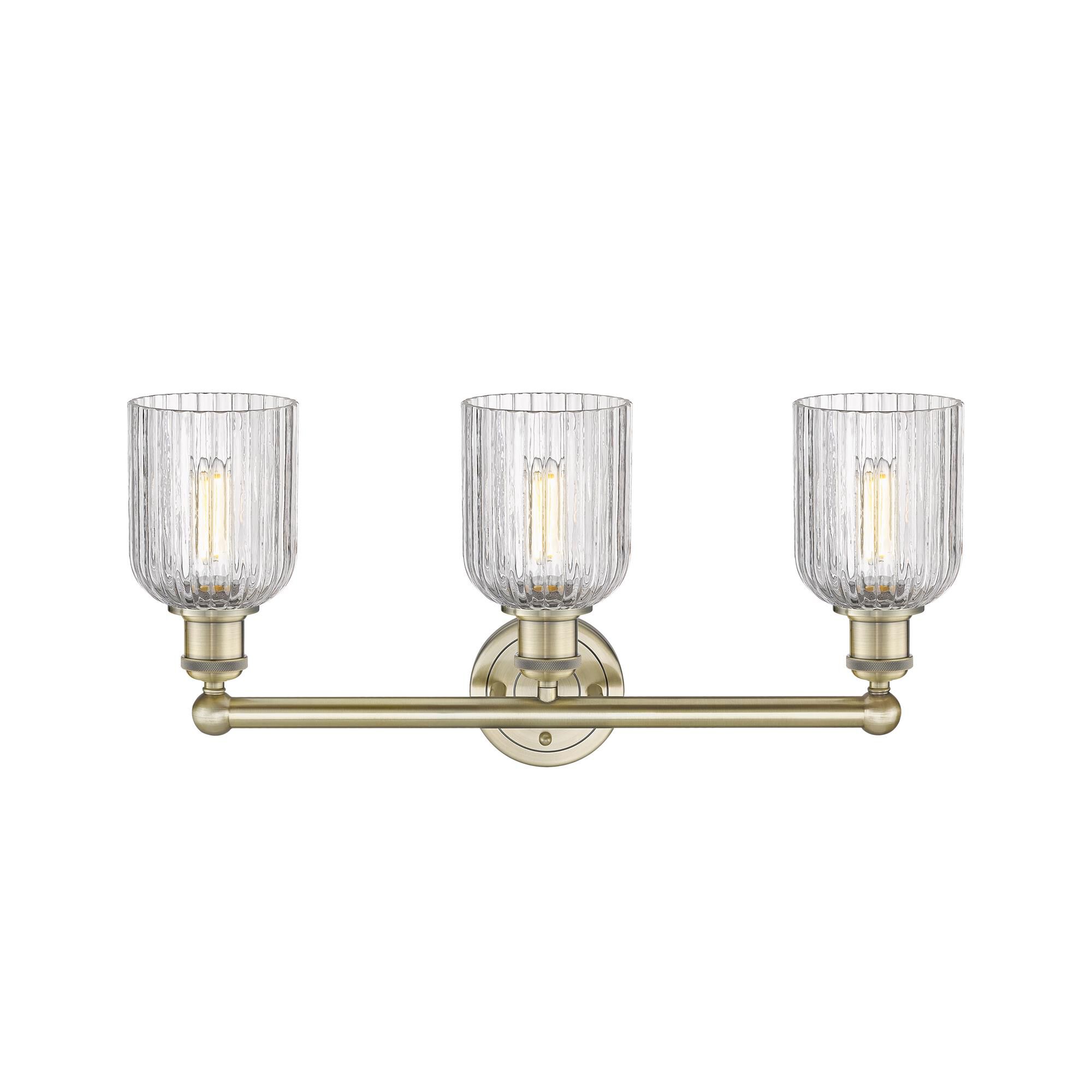 Shown in Antique Brass finish and Clear glass