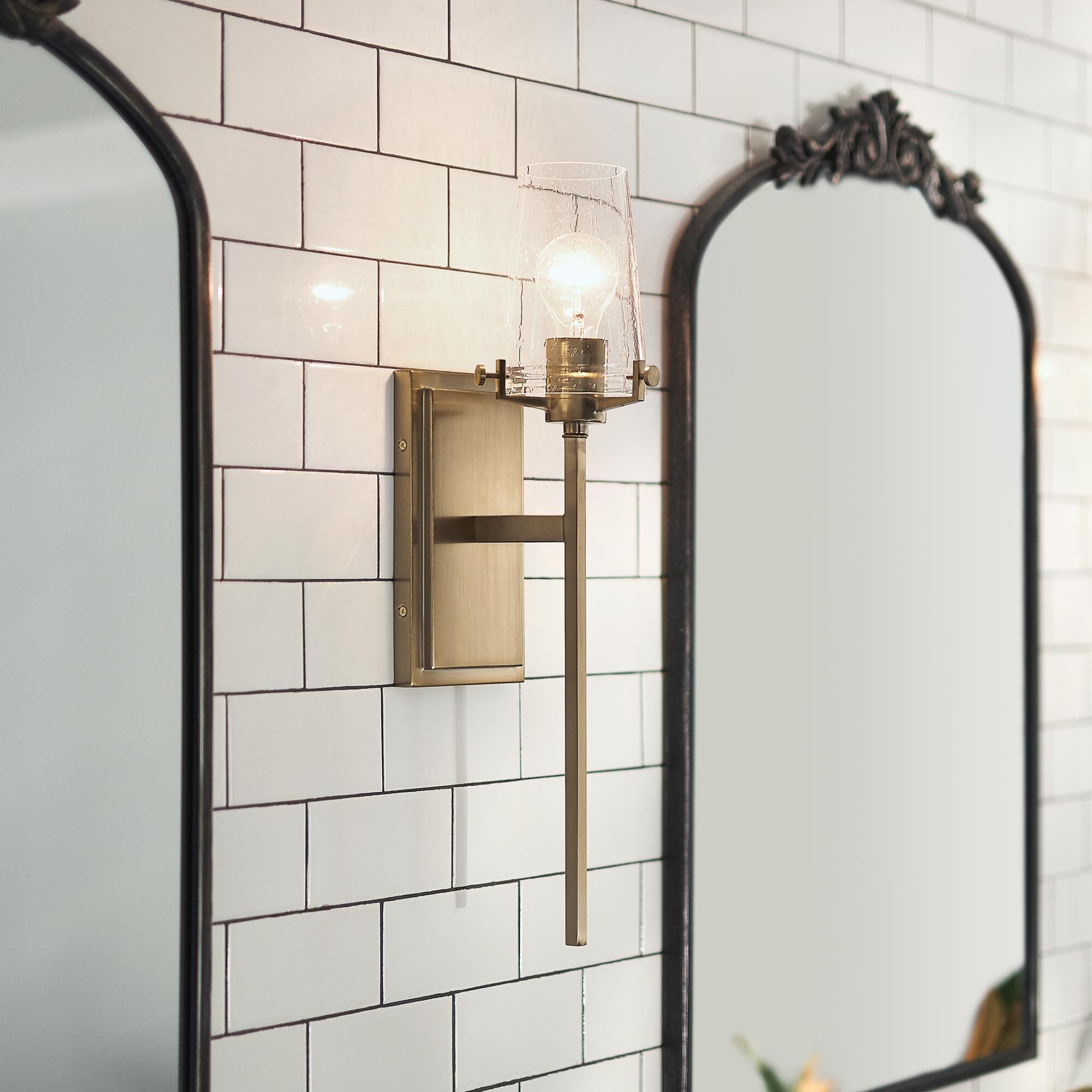 Shown in Champagne Bronze finish and Clear Seeded glass