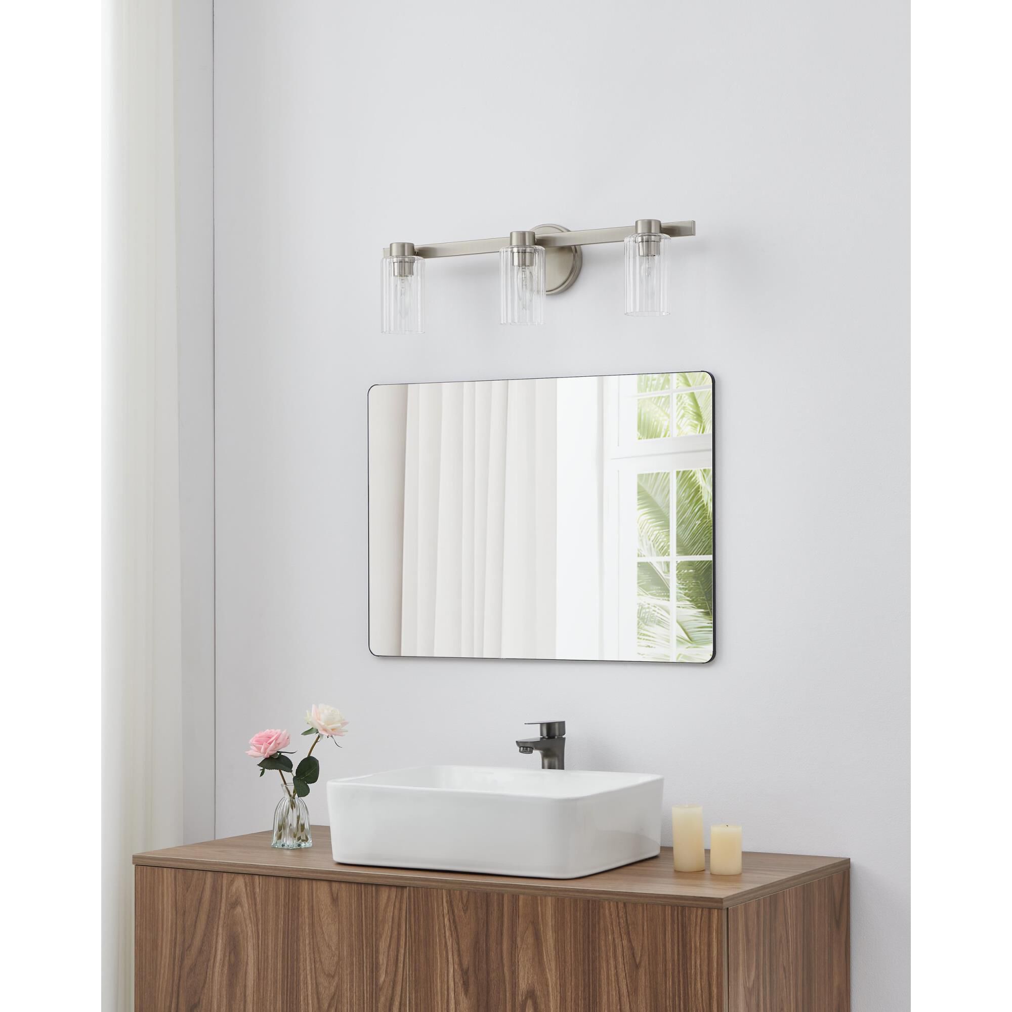 Shown in Brushed Nickel finish and Clear Ribbed glass