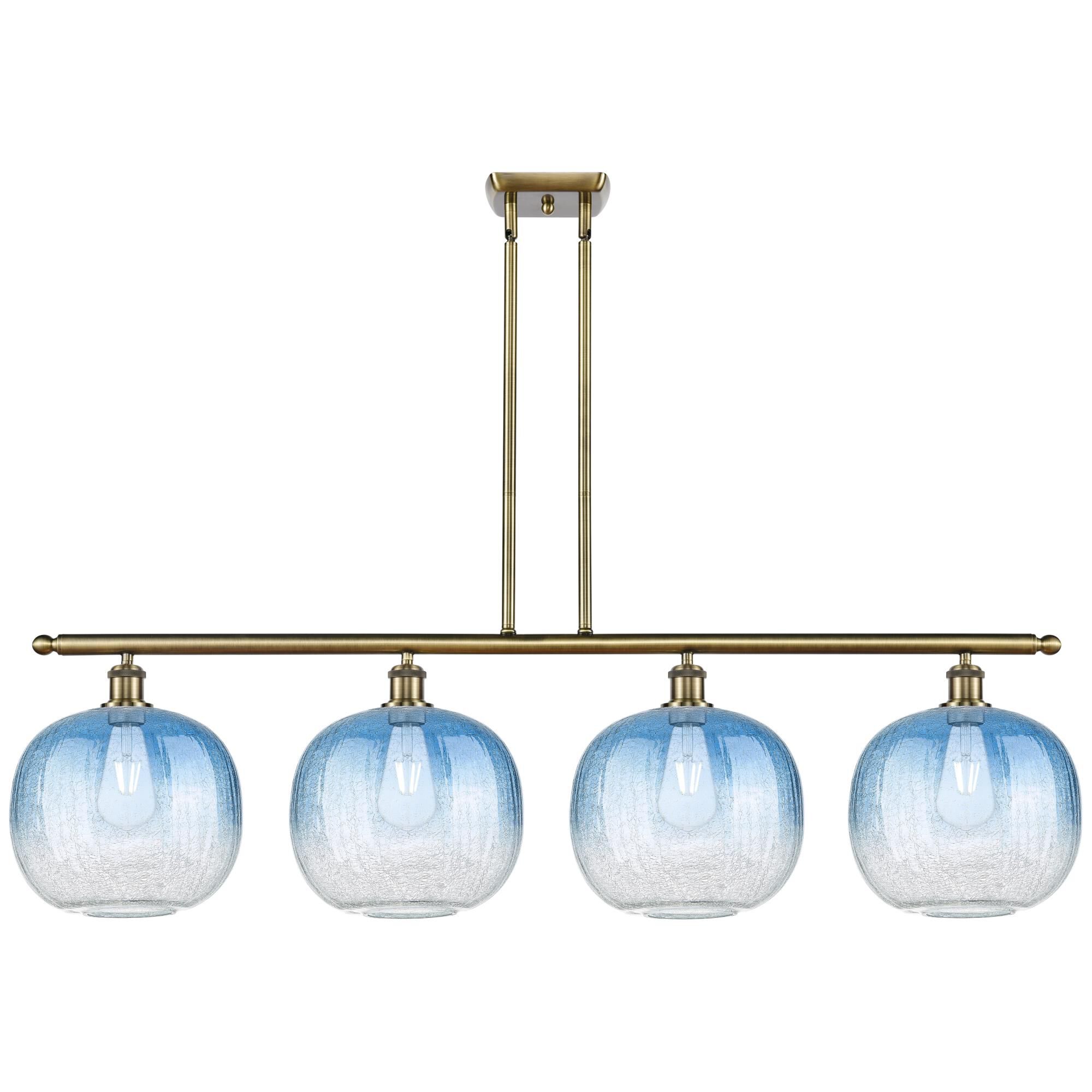 Shown in Antique Brass finish and Sapphire Blue glass