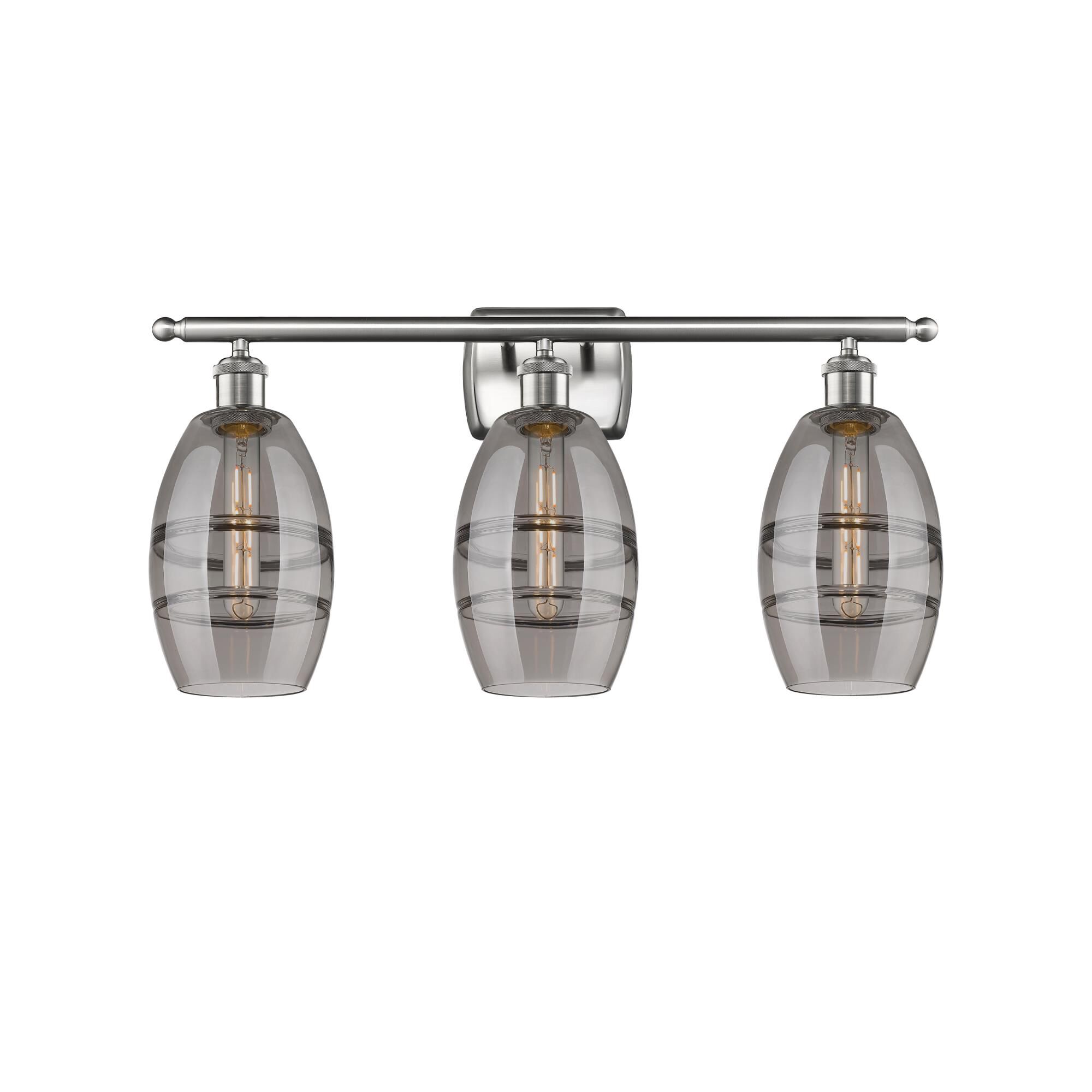 Shown in Brushed Satin Nickel finish and Light Smoke glass