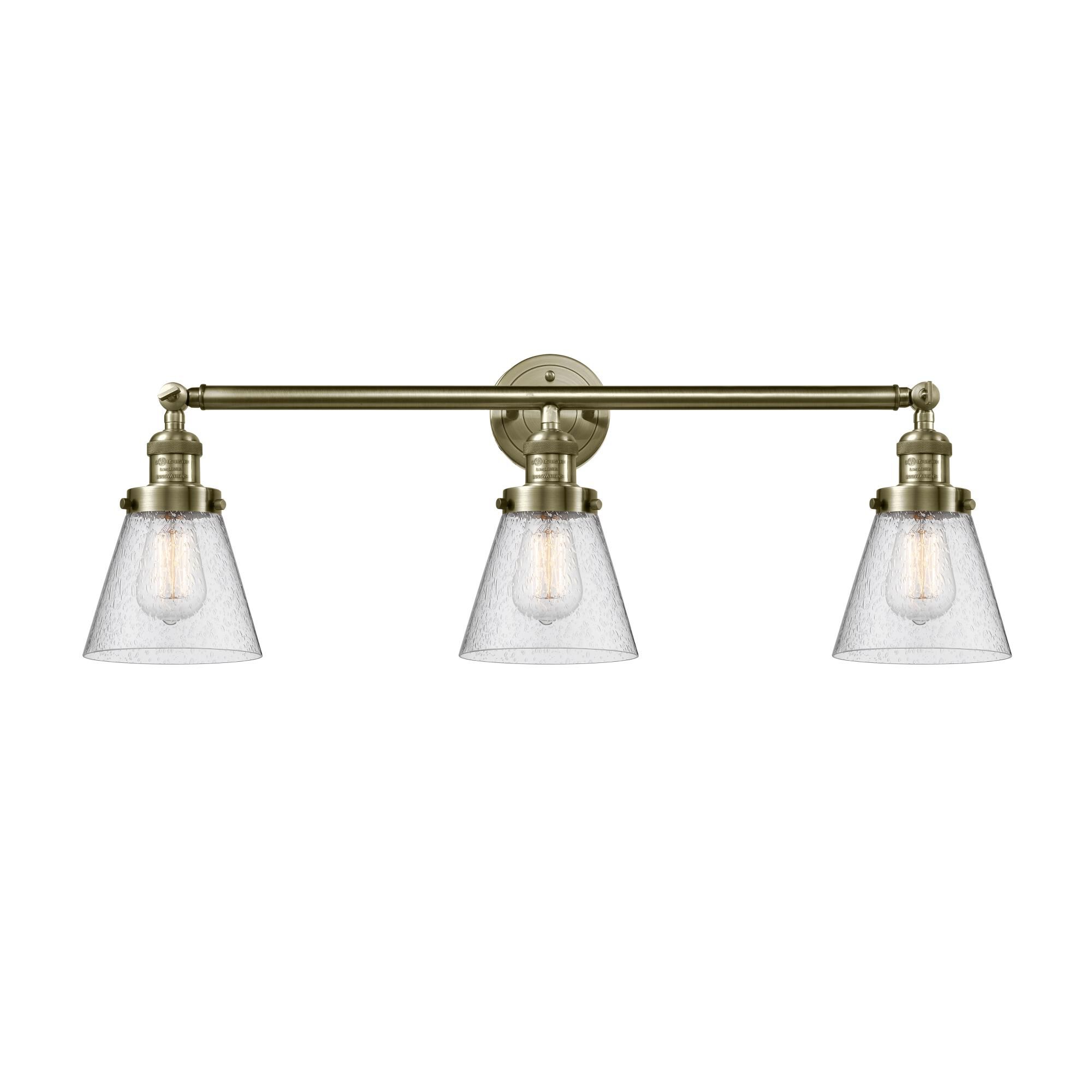 Shown in Antique Brass finish and Seedy glass
