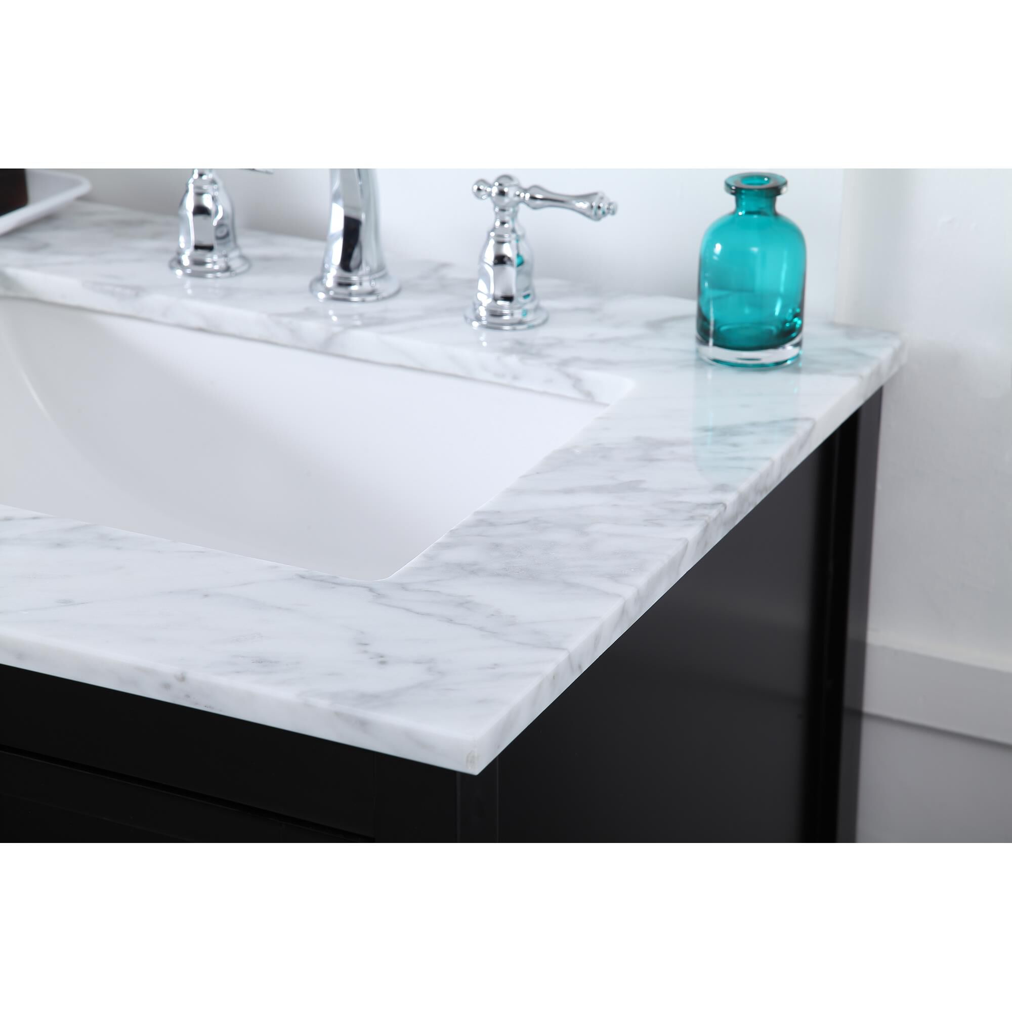 Shown in Black And Brushed Nickel With Carrara White Marble finish