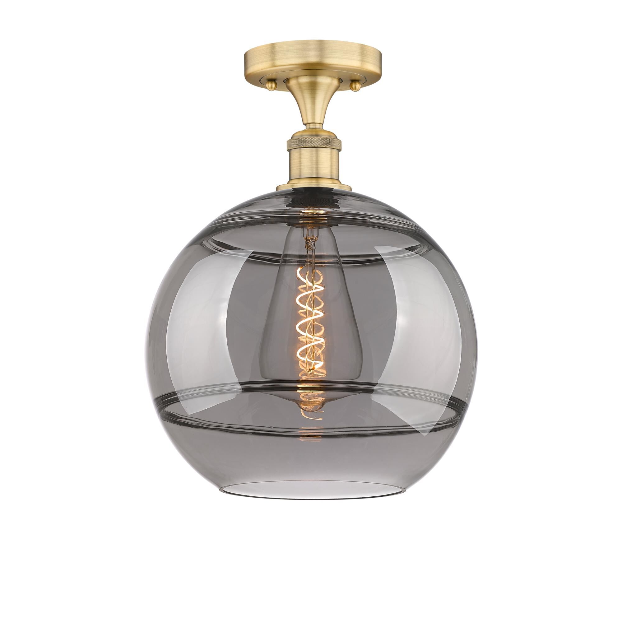 Shown in Brushed Brass finish and Light Smoke glass