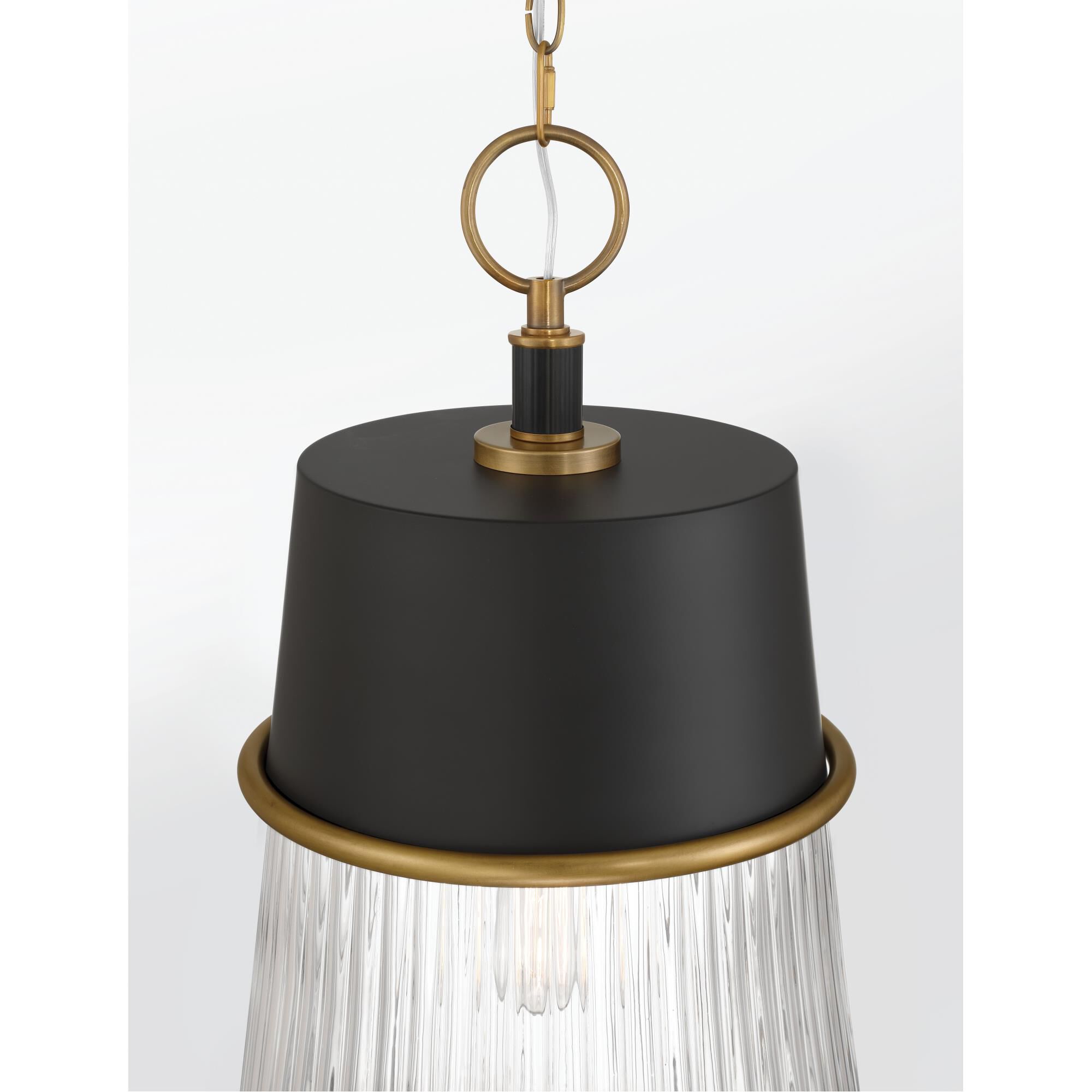 Shown in Legacy Brass & Dark Matte Blac finish and Clear glass and Ribbed Glass shade