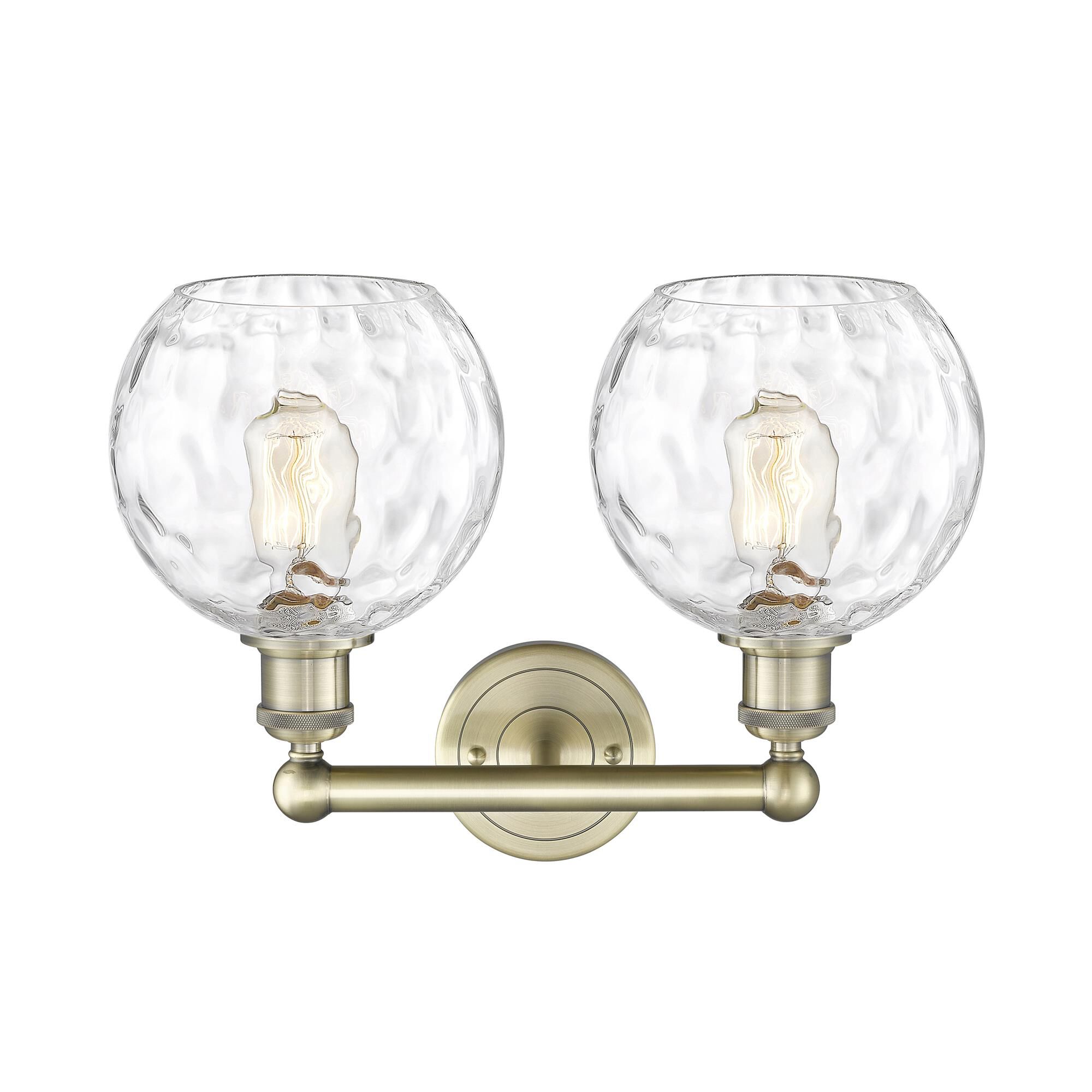 Shown in Antique Brass finish and Clear glass