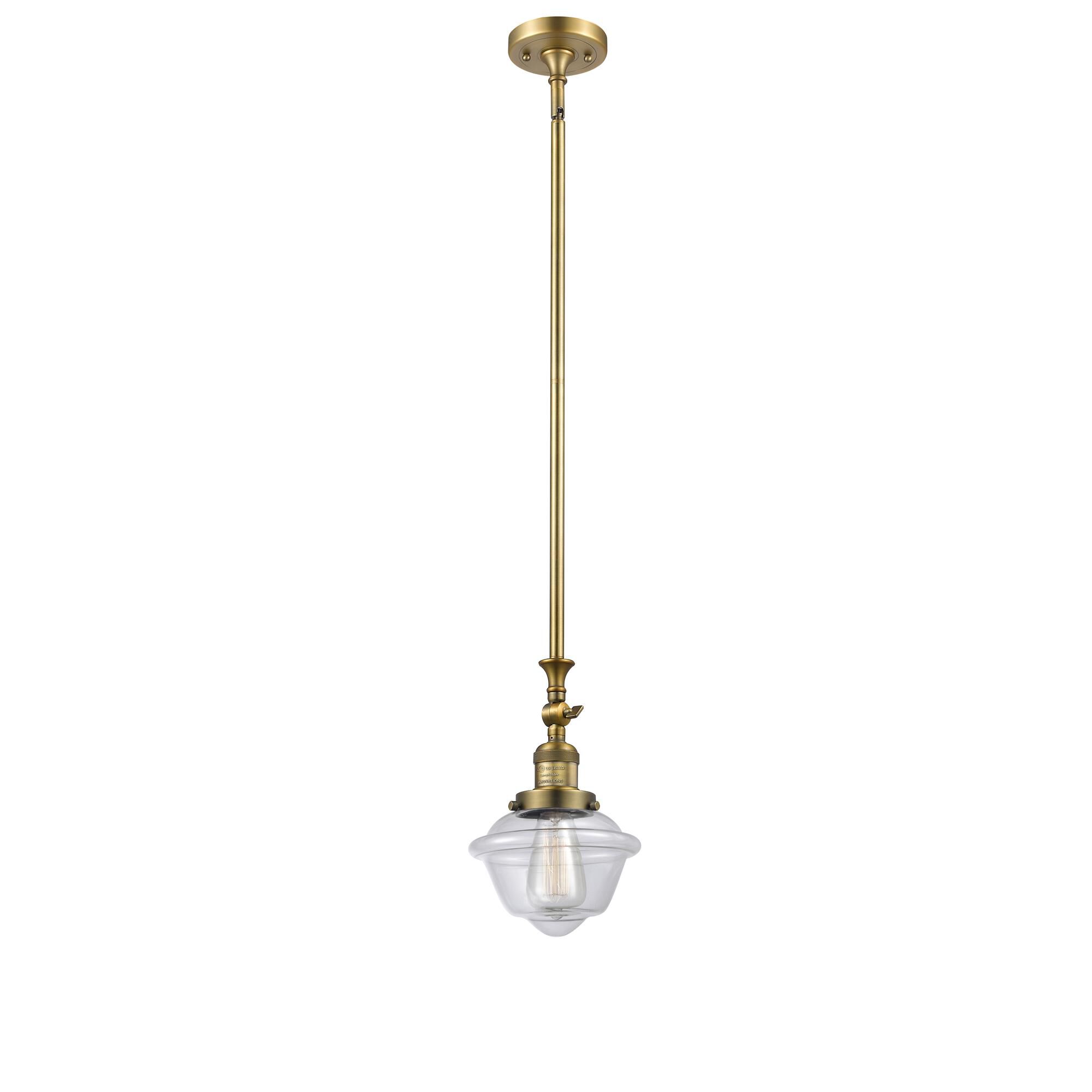 Shown in Brushed Brass finish and Clear glass