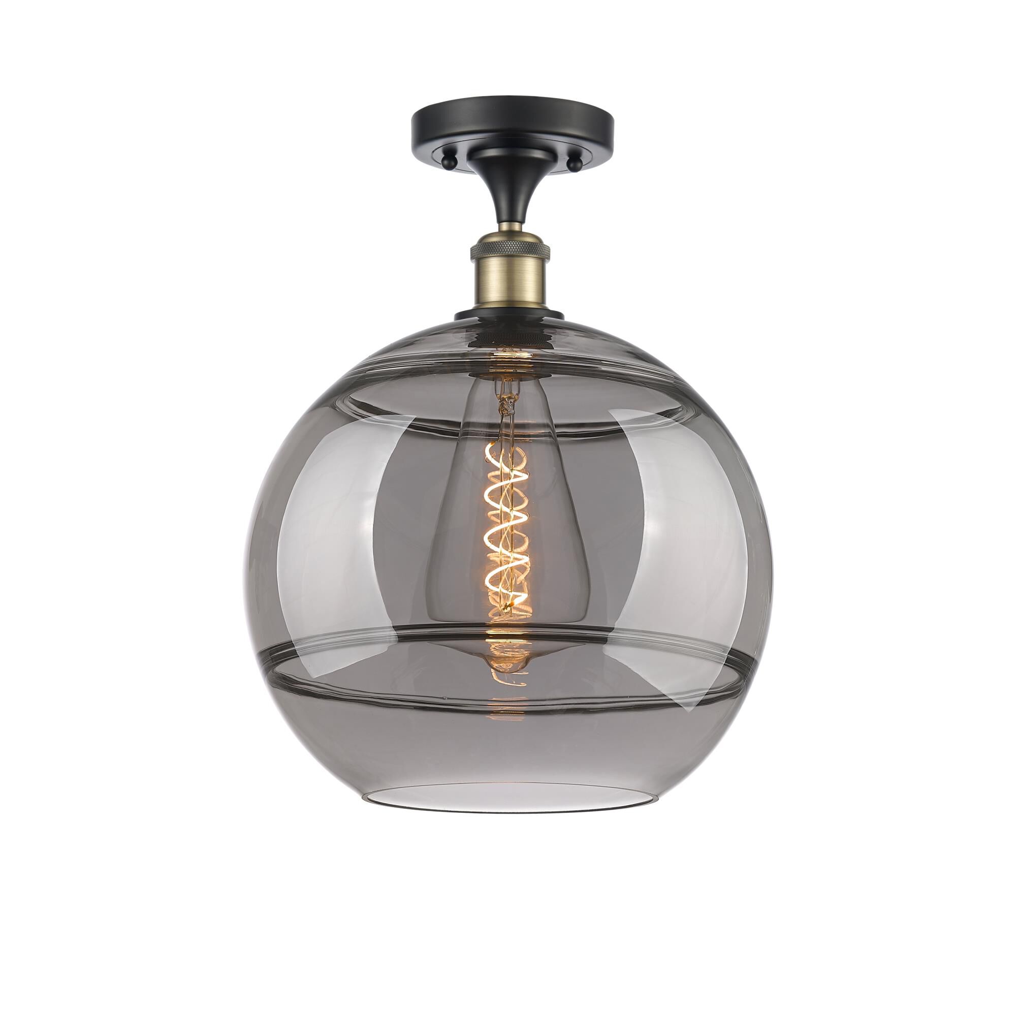 Shown in Black Antique Brass finish and Light Smoke glass