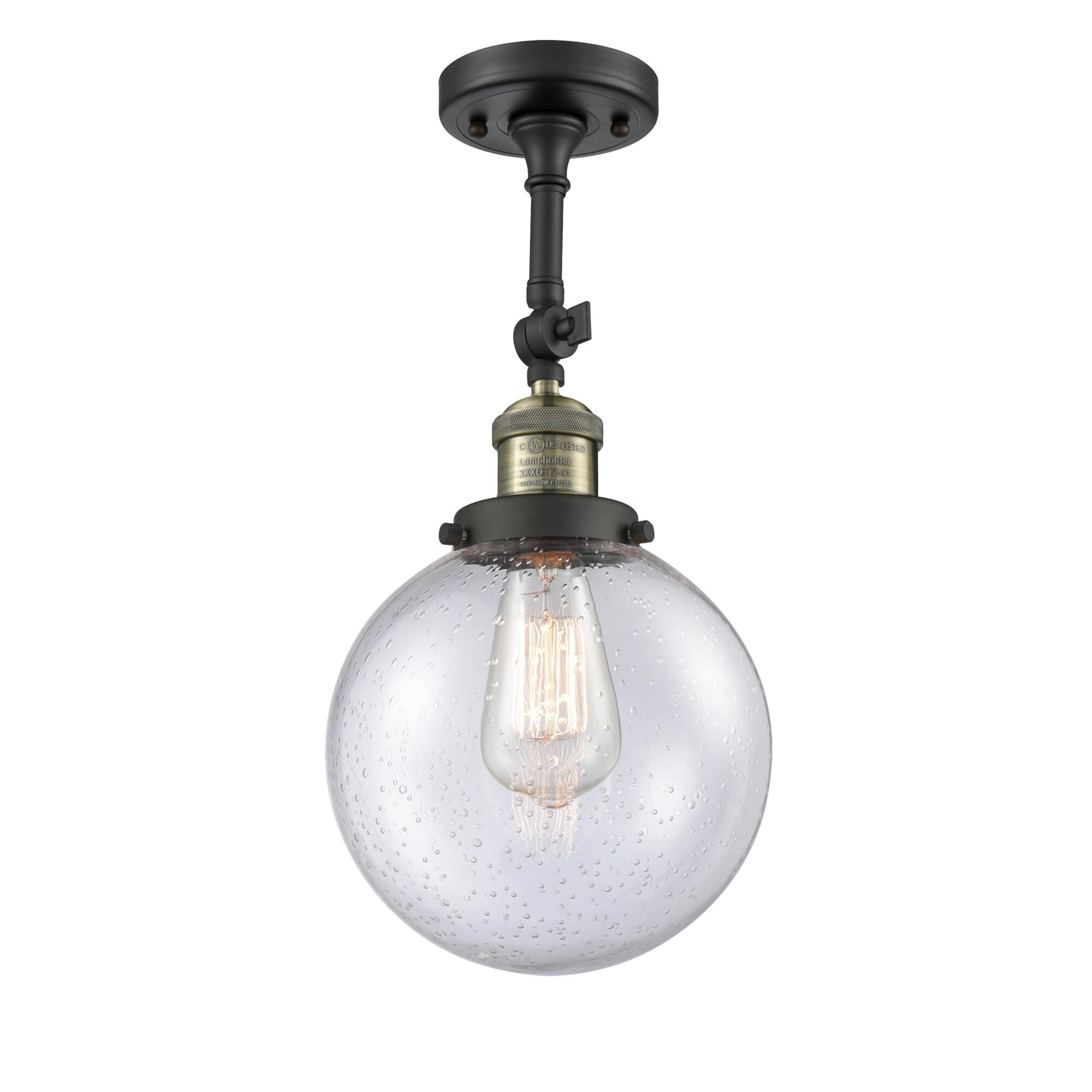 Shown in Black Antique Brass finish and Seedy glass and No Accent accent