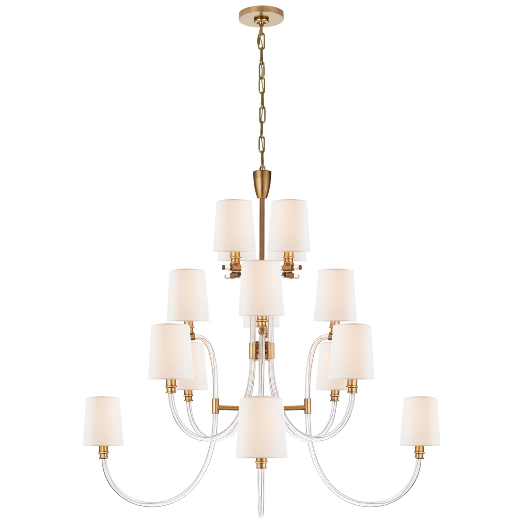 Shown in Crystal With Antique Brass finish and Linen shade