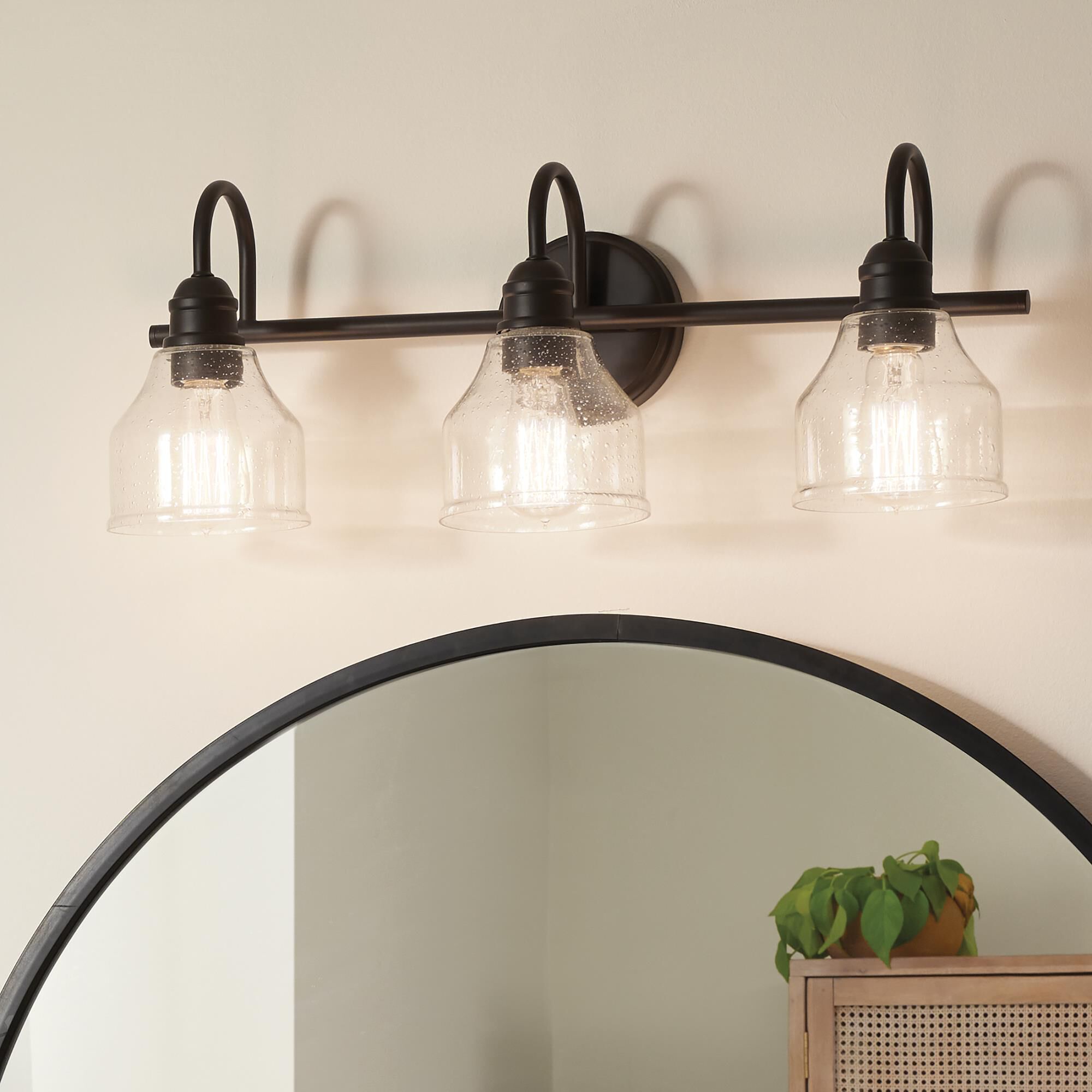 Shown in Olde Bronze finish and Clear Seeded glass