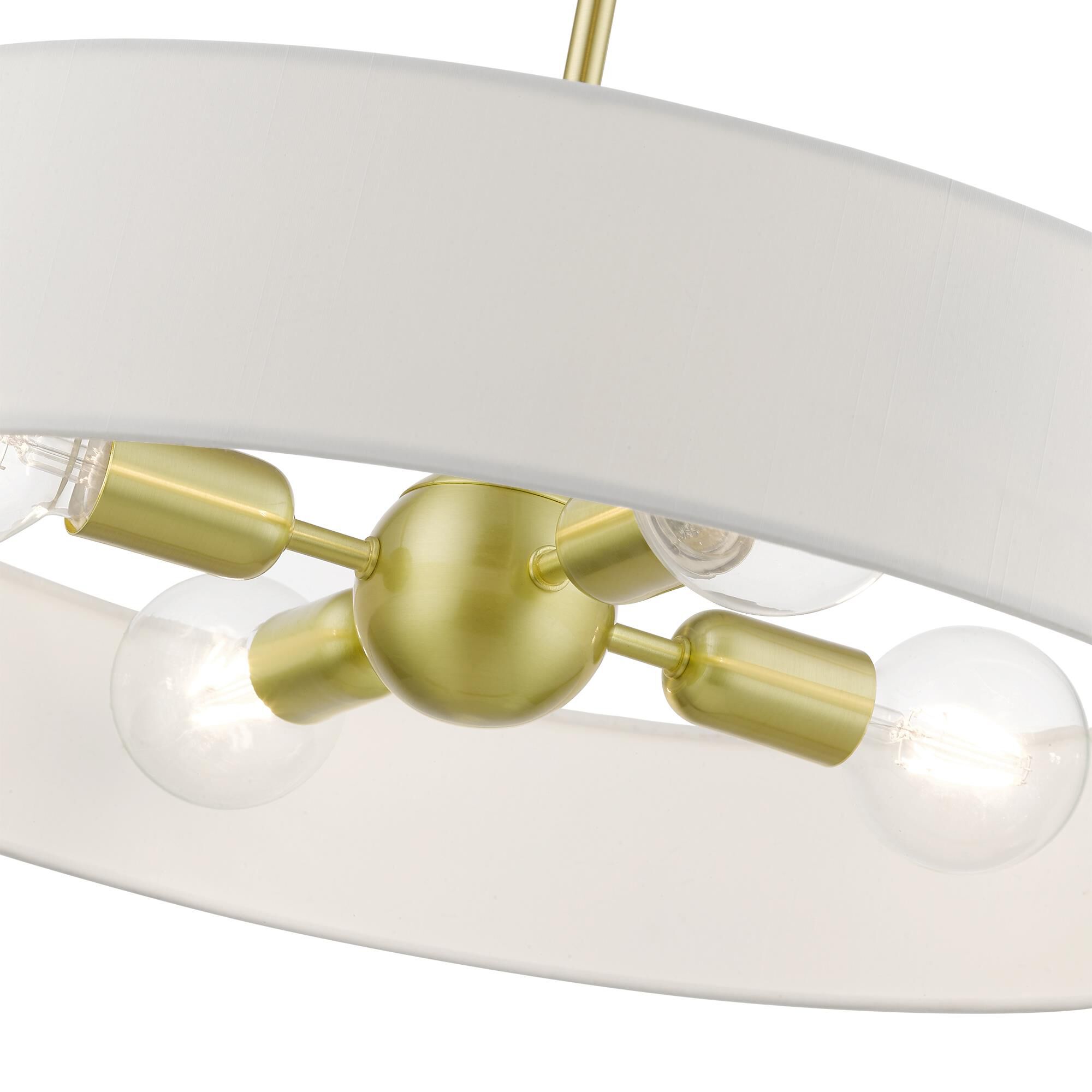 Shown in Satin Brass with Shiny White Accents finish and Hand Crafted Off-White Hardback Fabric shade