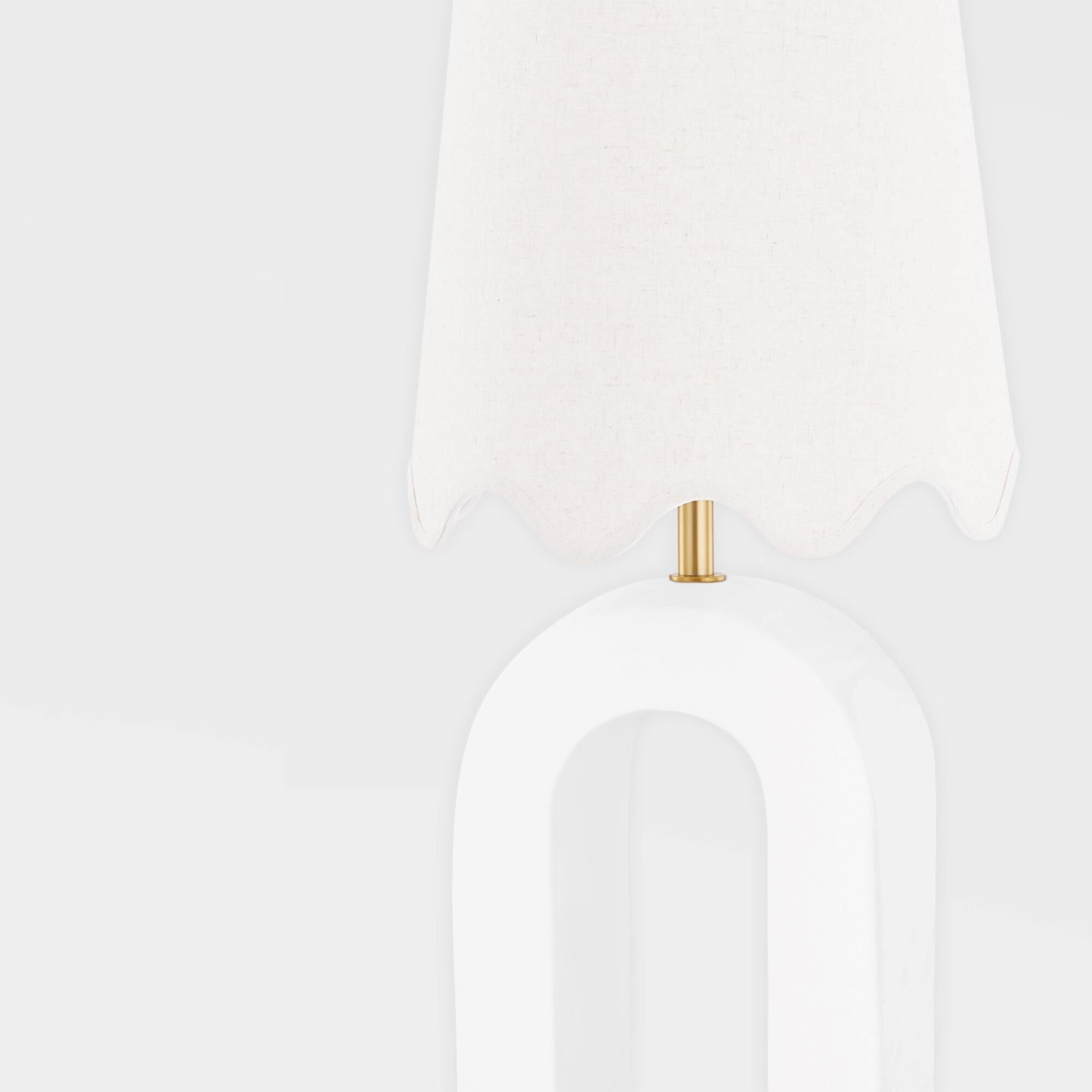 Shown in Aged Brass and Ceramic Raw Matte White finish and Natural Linen shade