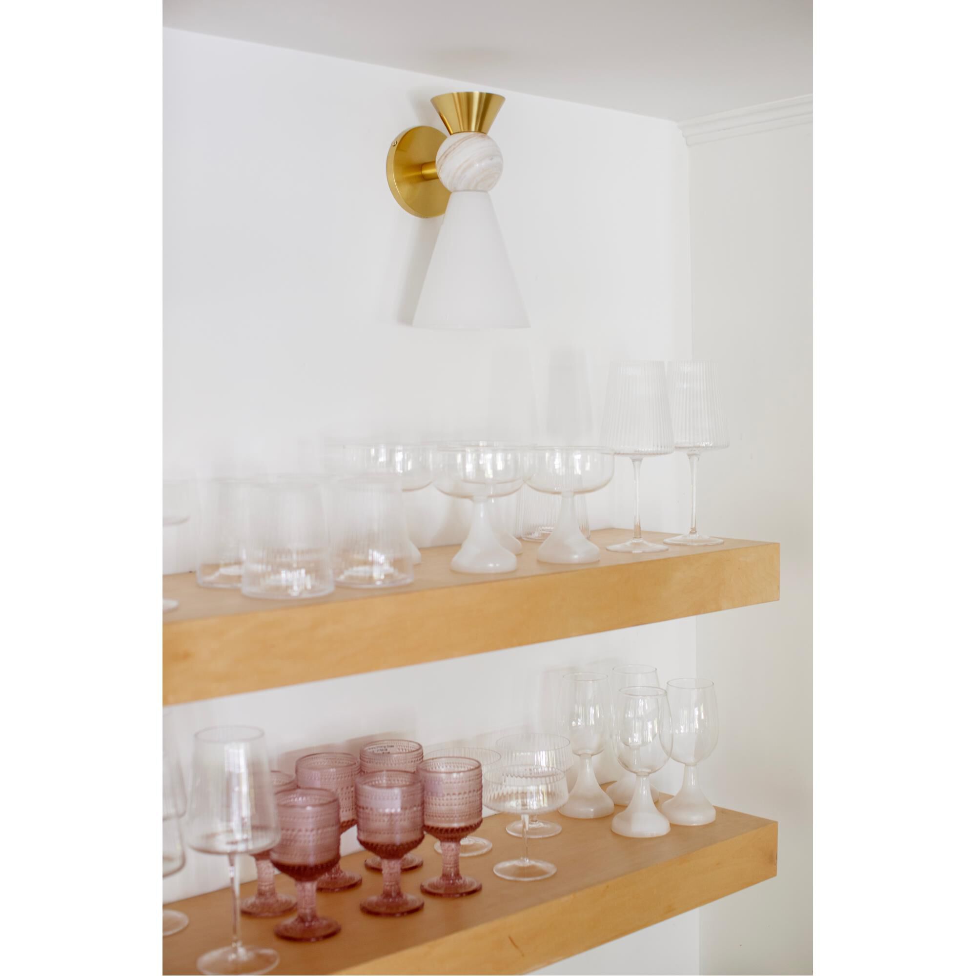 Shown in Aged Brass finish and Opal Shiny glass