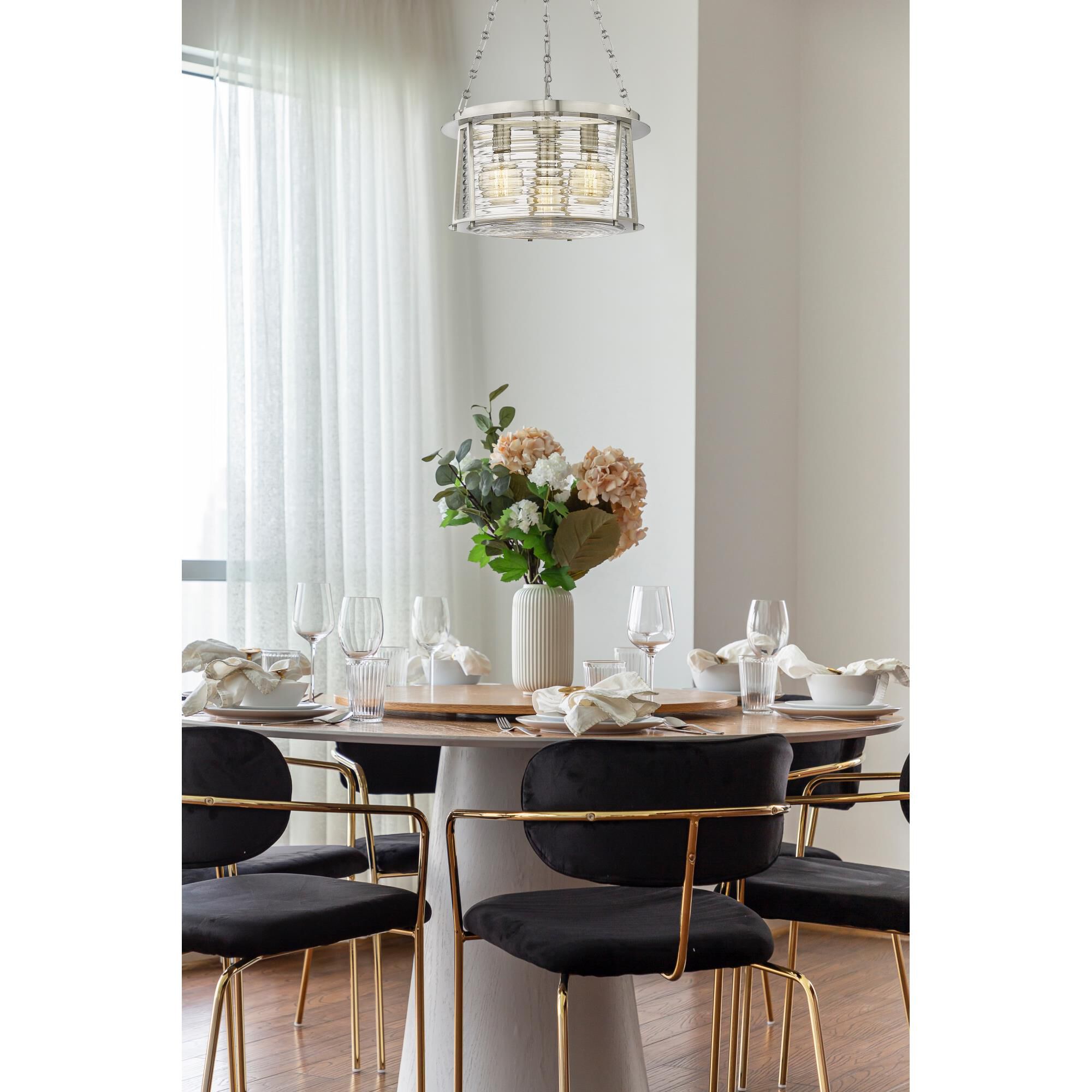 Shown in Brushed Nickel finish and Water Hammered glass