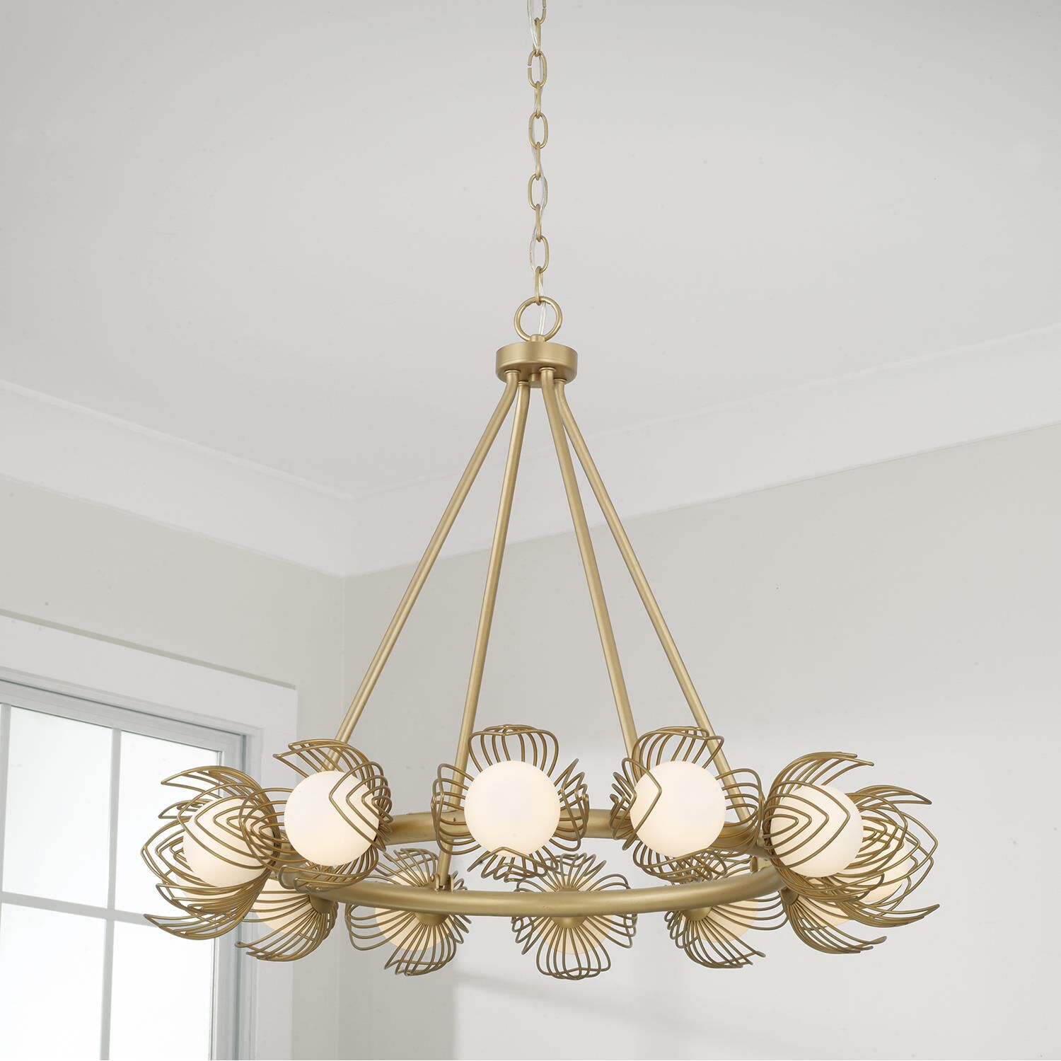 Shown in Buffed Gold finish and Soft White  Globes glass