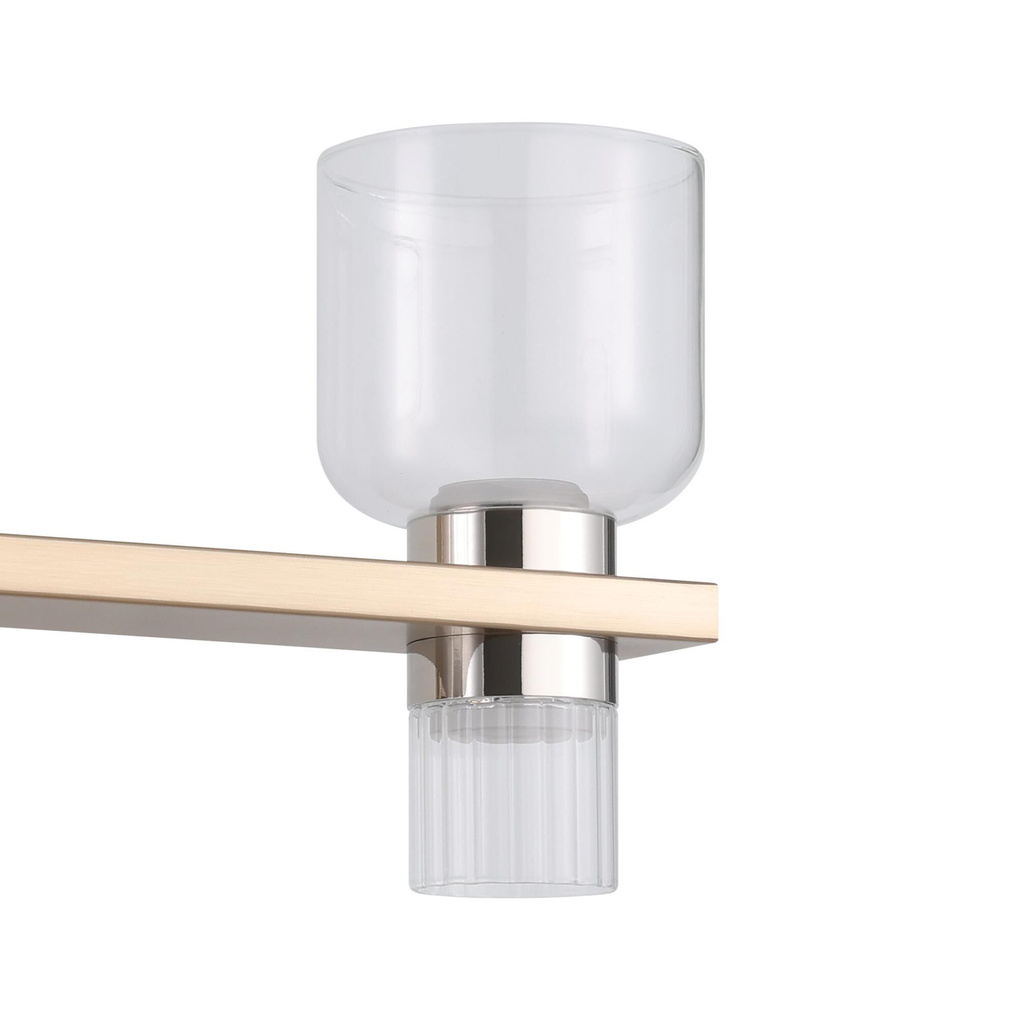 Shown in Champagne Gold finish and Clear, Clear Ribbed glass
