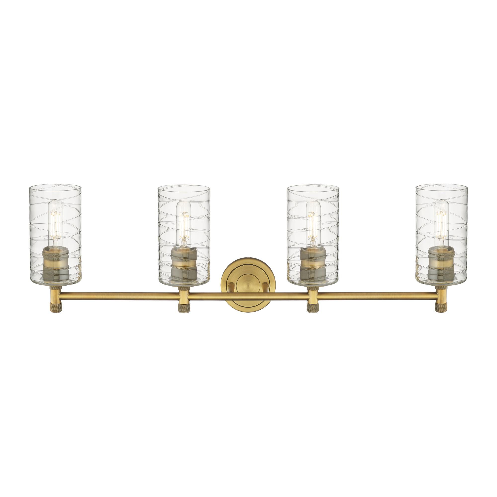 Shown in Brushed Brass finish and Deco Swirl glass