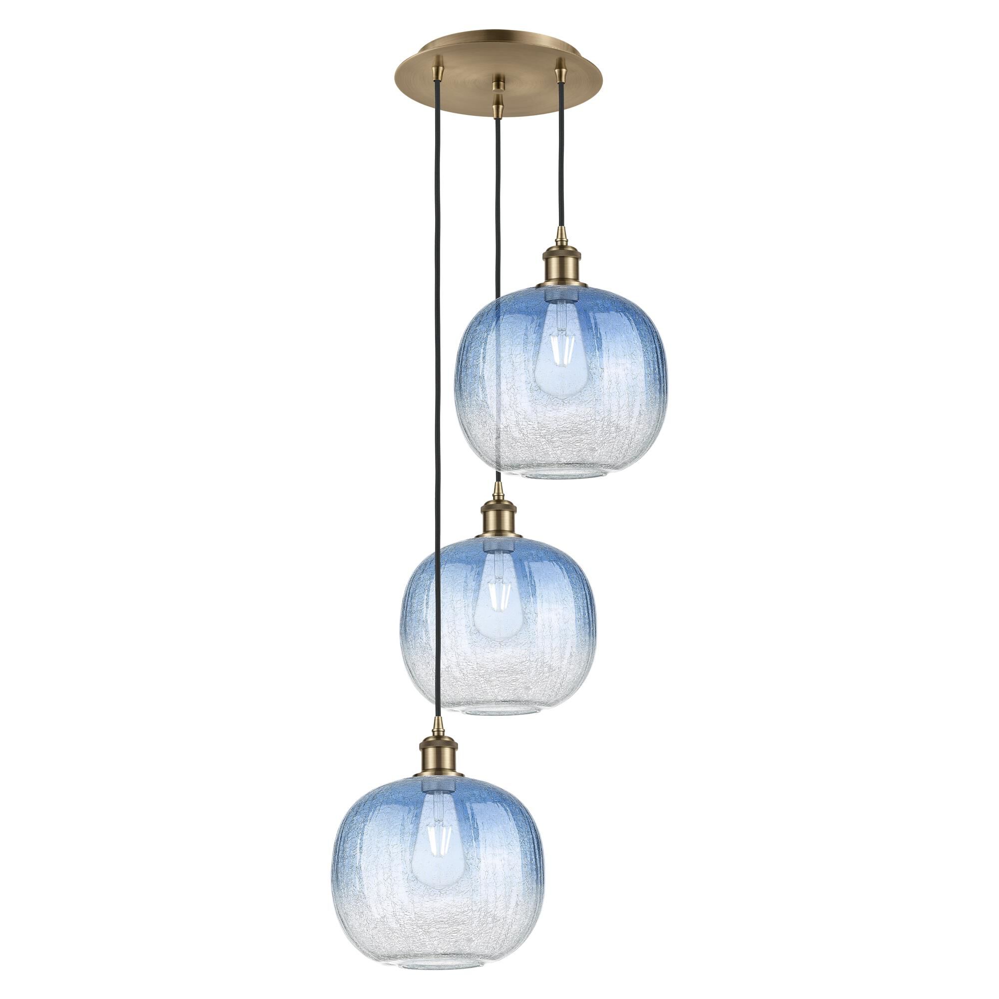 Shown in Antique Brass finish and Sapphire Blue glass