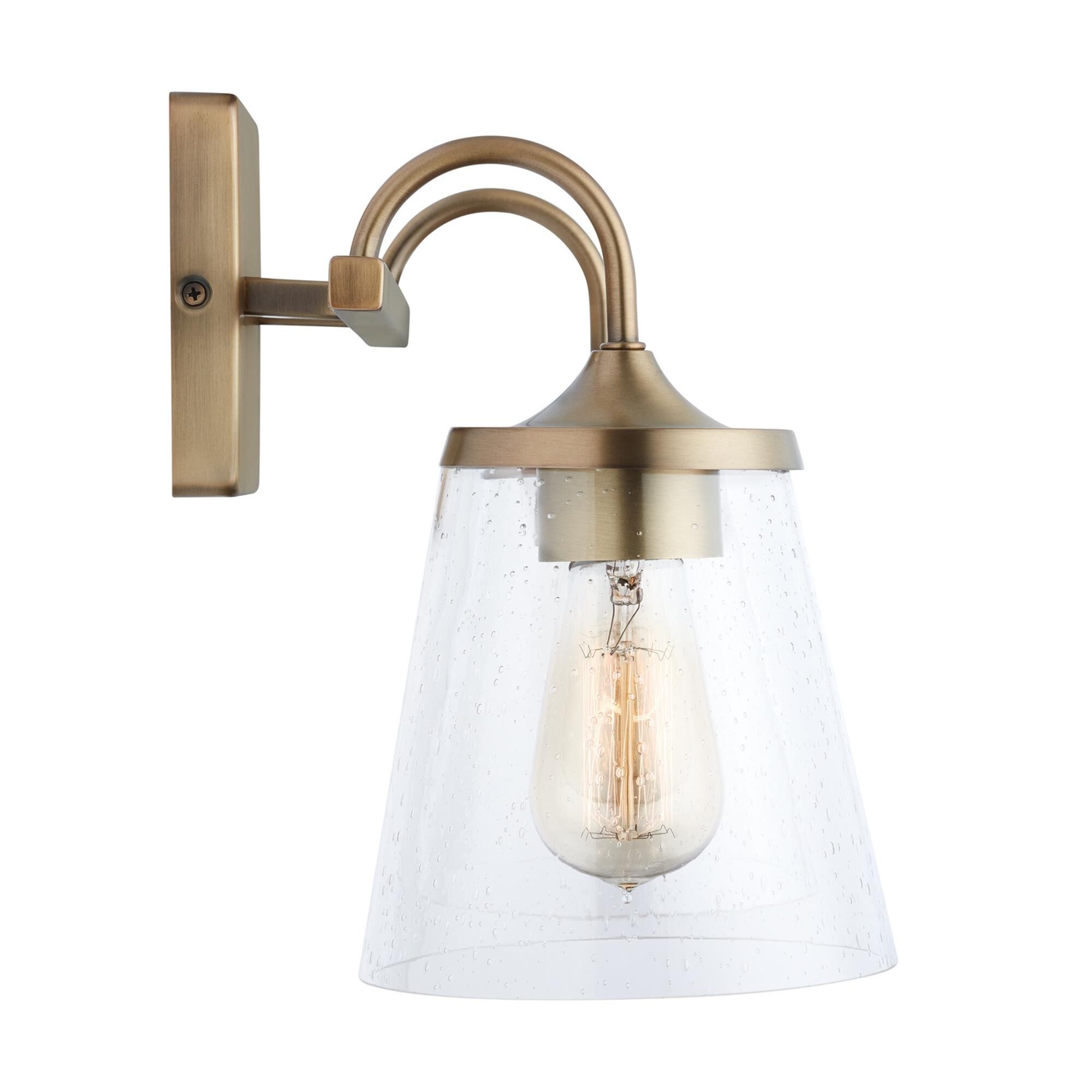 Shown in Aged Brass finish and Clear Seeded glass