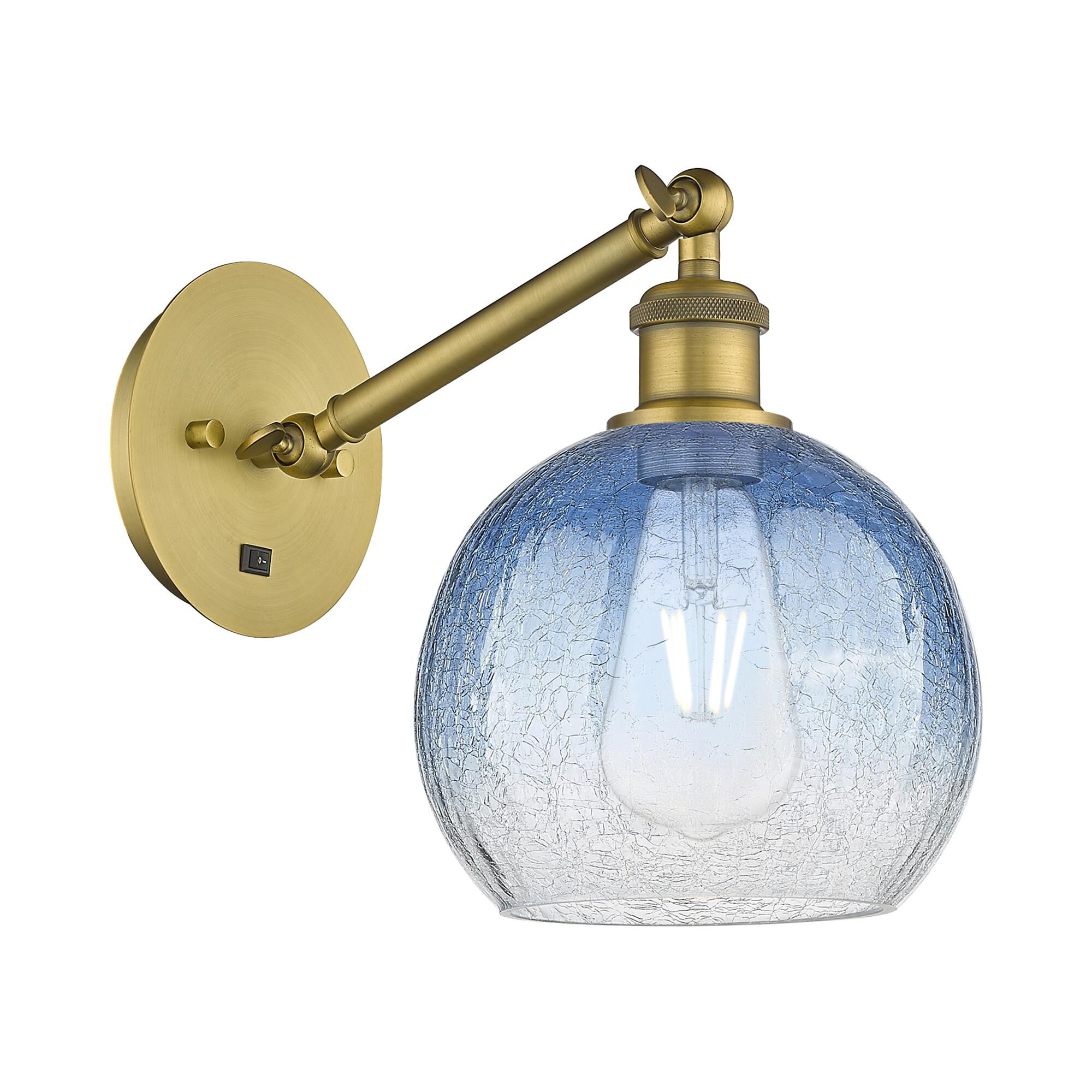 Shown in Brushed Brass finish and Sapphire Blue glass